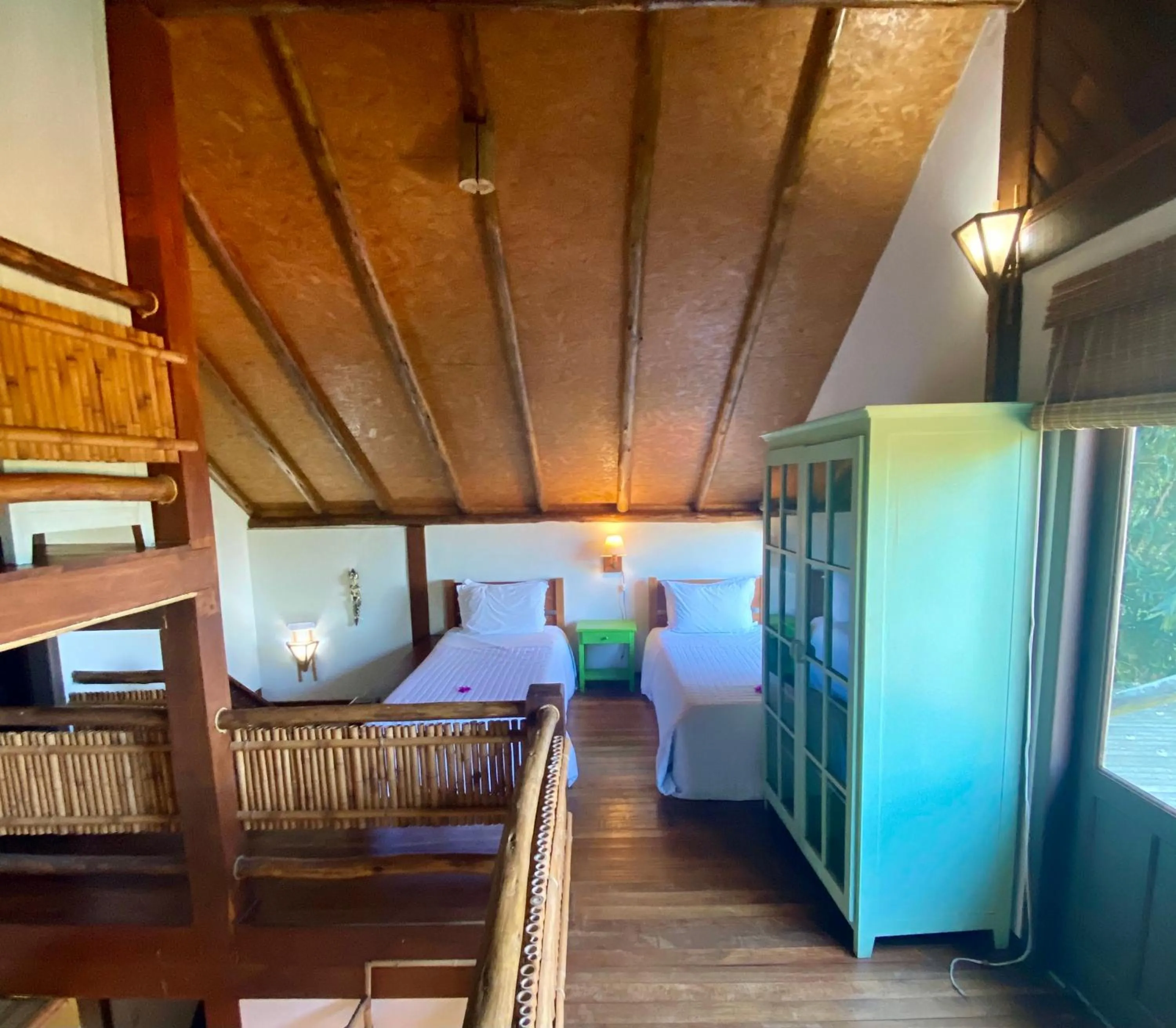 Bed in Pousada Bungalow