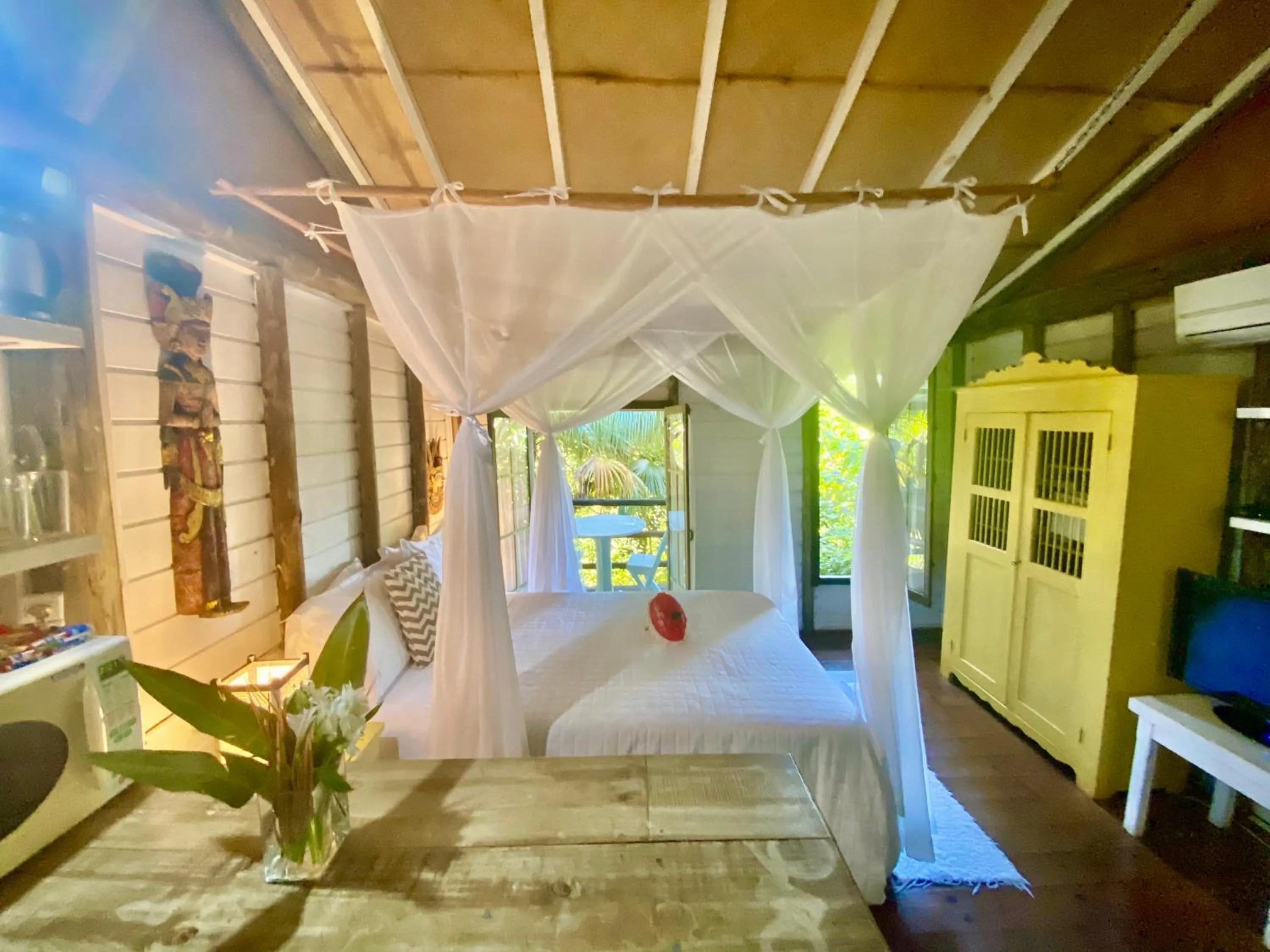 Bed in Pousada Bungalow