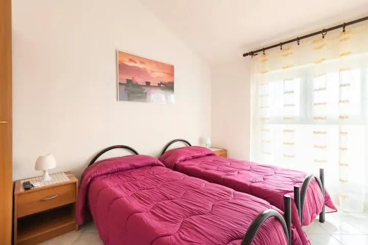 Bed in Casa Vacanze Nuraghe Talia