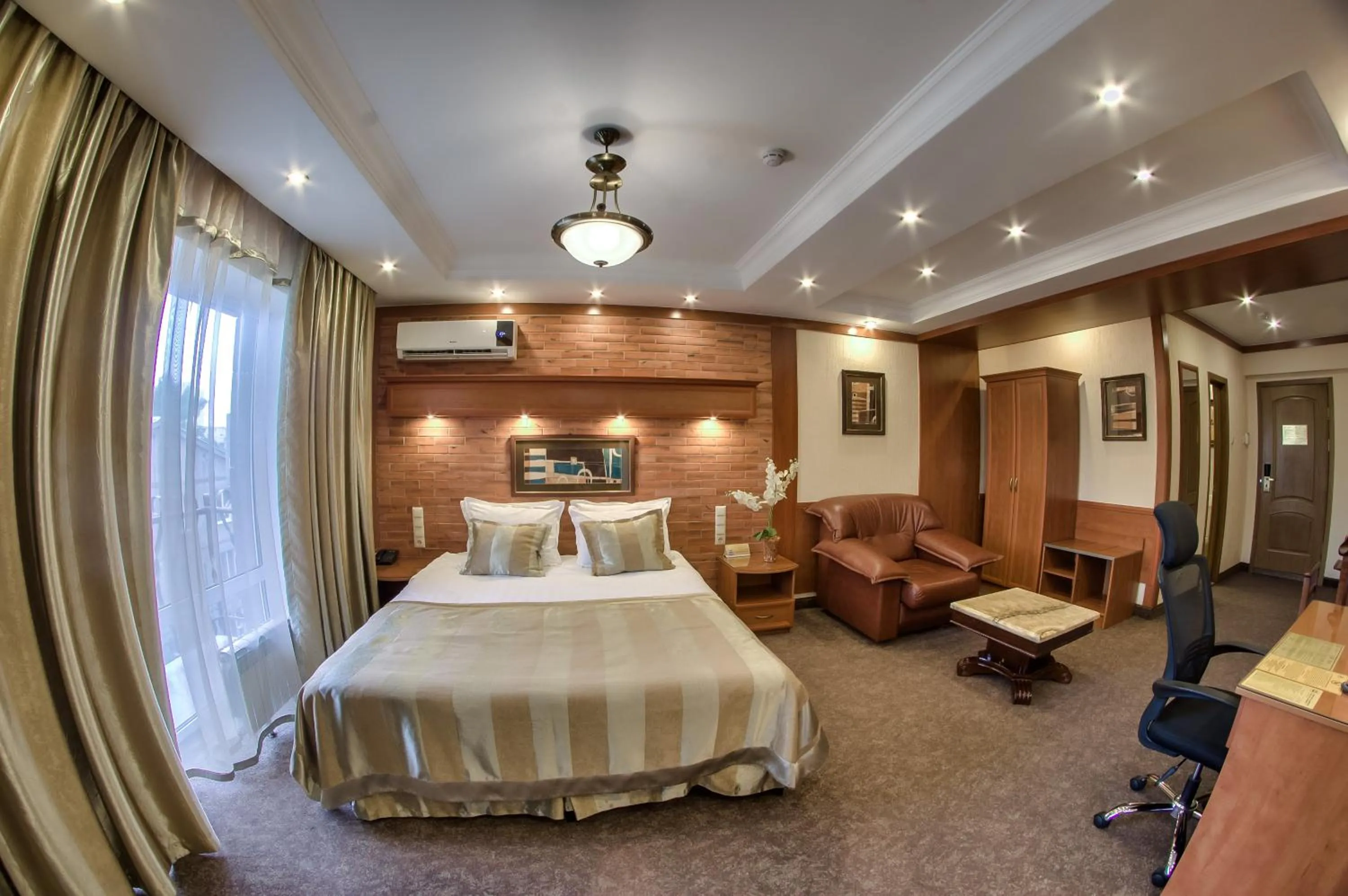 Property building, Bed in Hotel Uyut Almaty