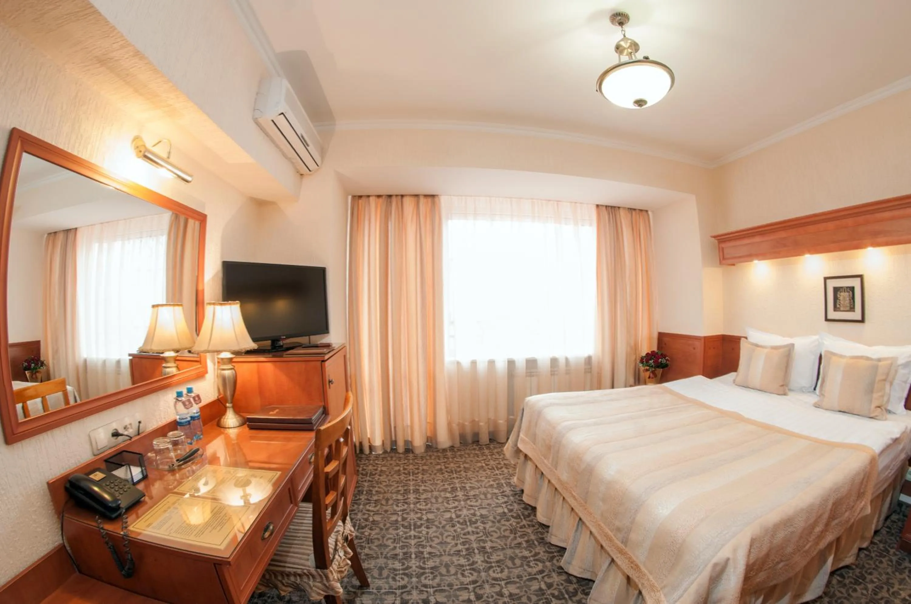 Photo of the whole room, Bed in Hotel Uyut Almaty