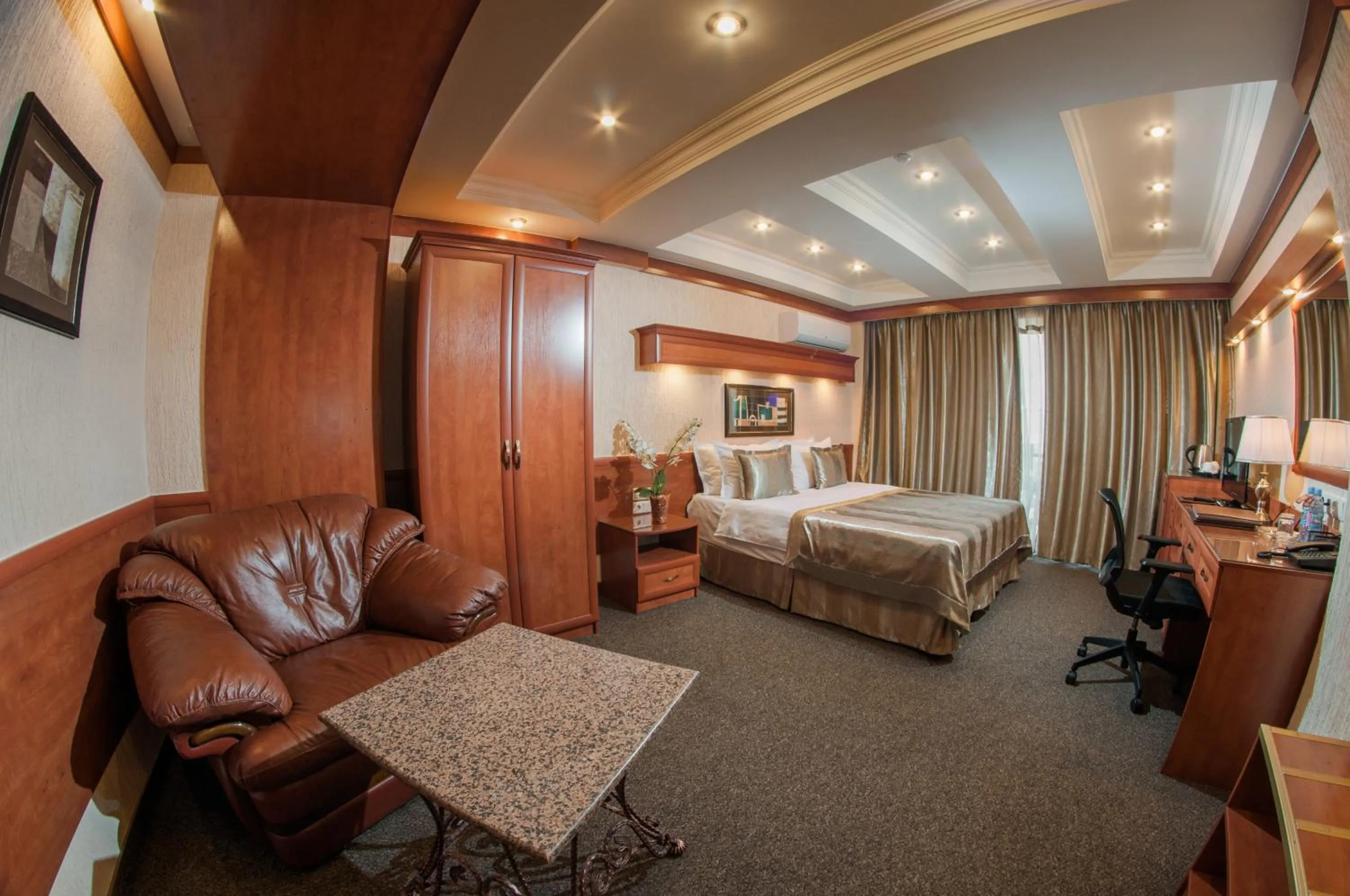 Photo of the whole room, Bed in Hotel Uyut Almaty