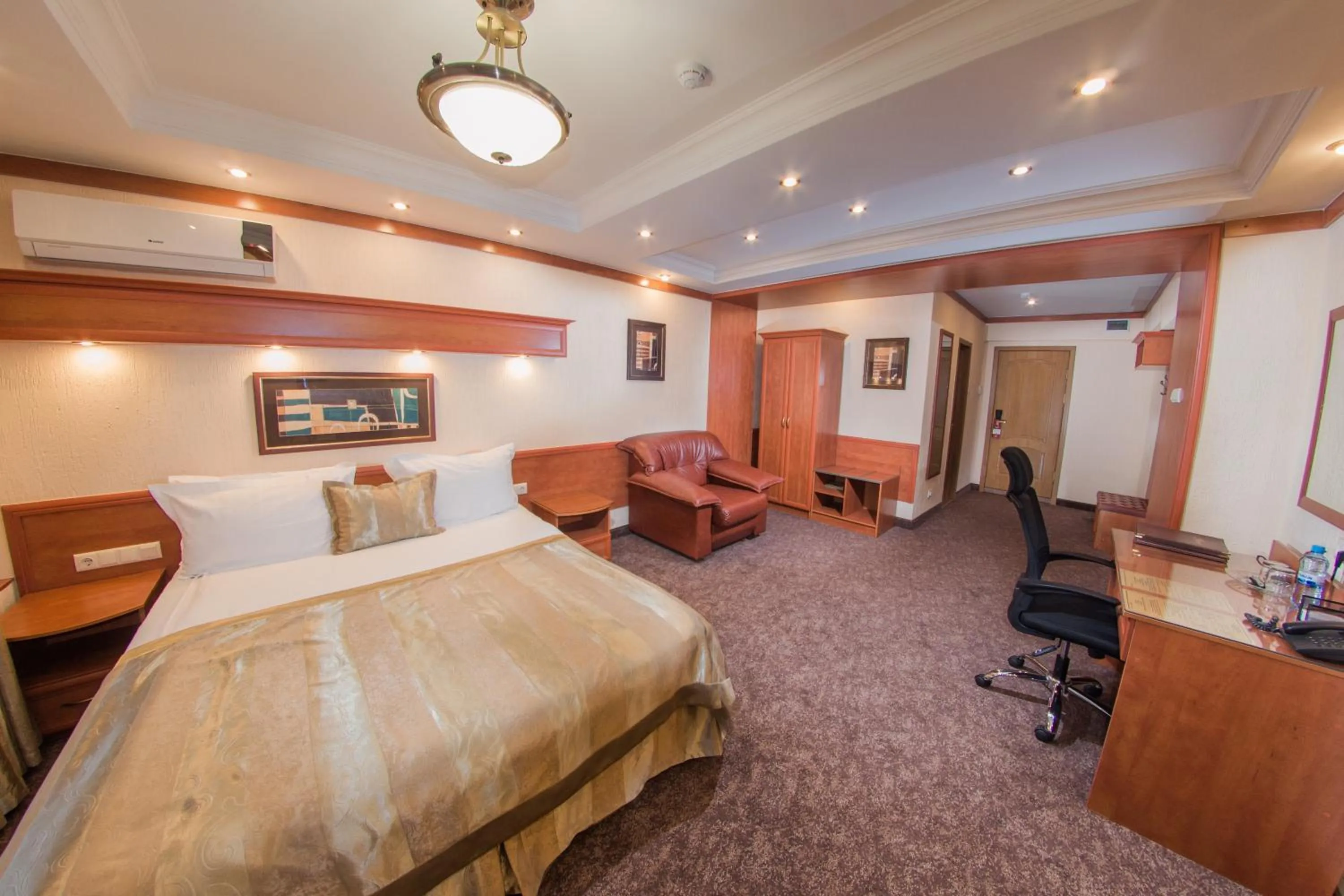 Photo of the whole room, Bed in Hotel Uyut Almaty