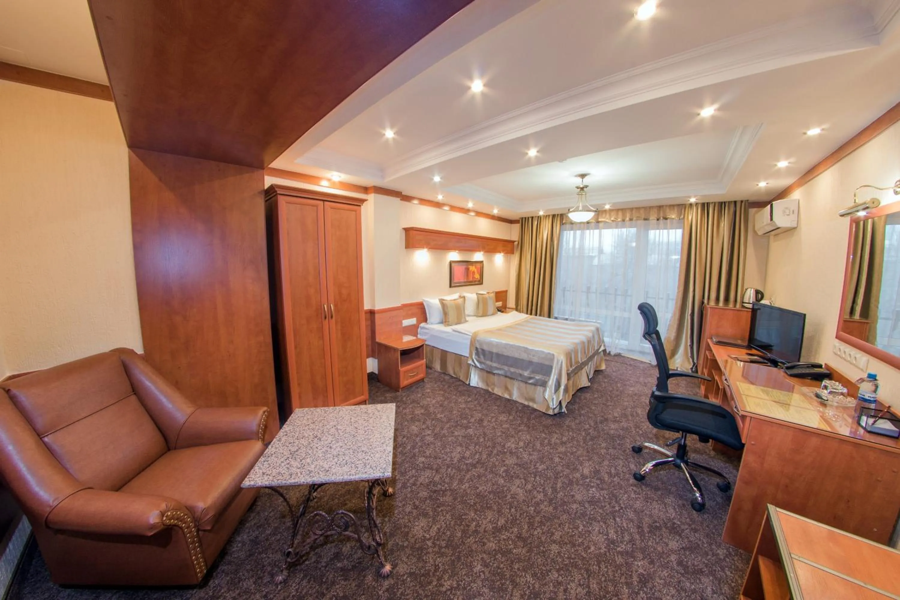 Photo of the whole room, Bed in Hotel Uyut Almaty