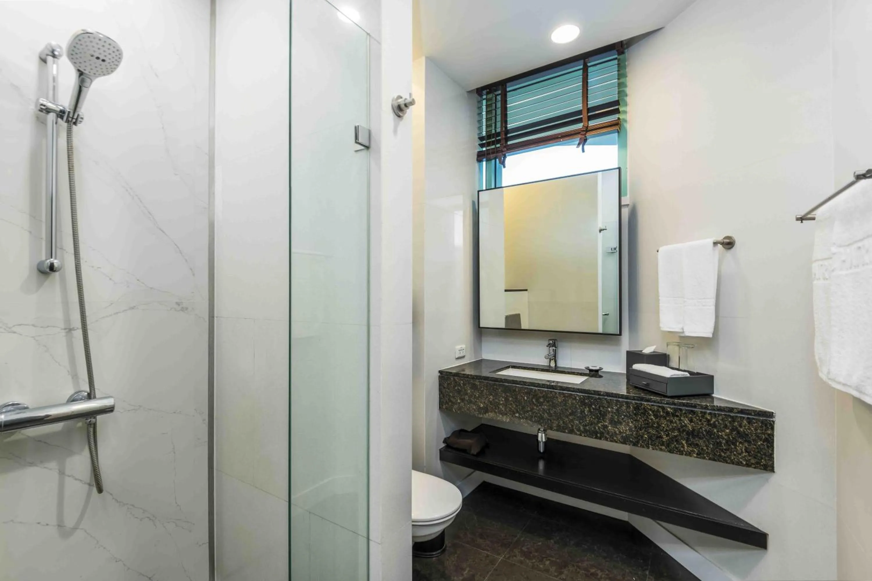 Shower in Chatrium Hotel Riverside Bangkok