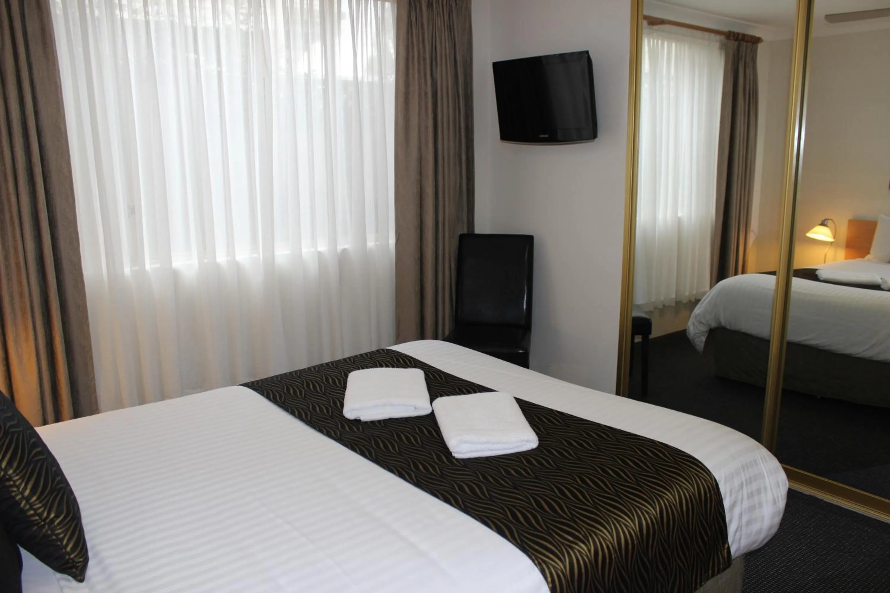 Bedroom, Bed in Beaches Serviced Apartments