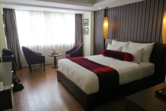 Bed in Golden Art Hotel