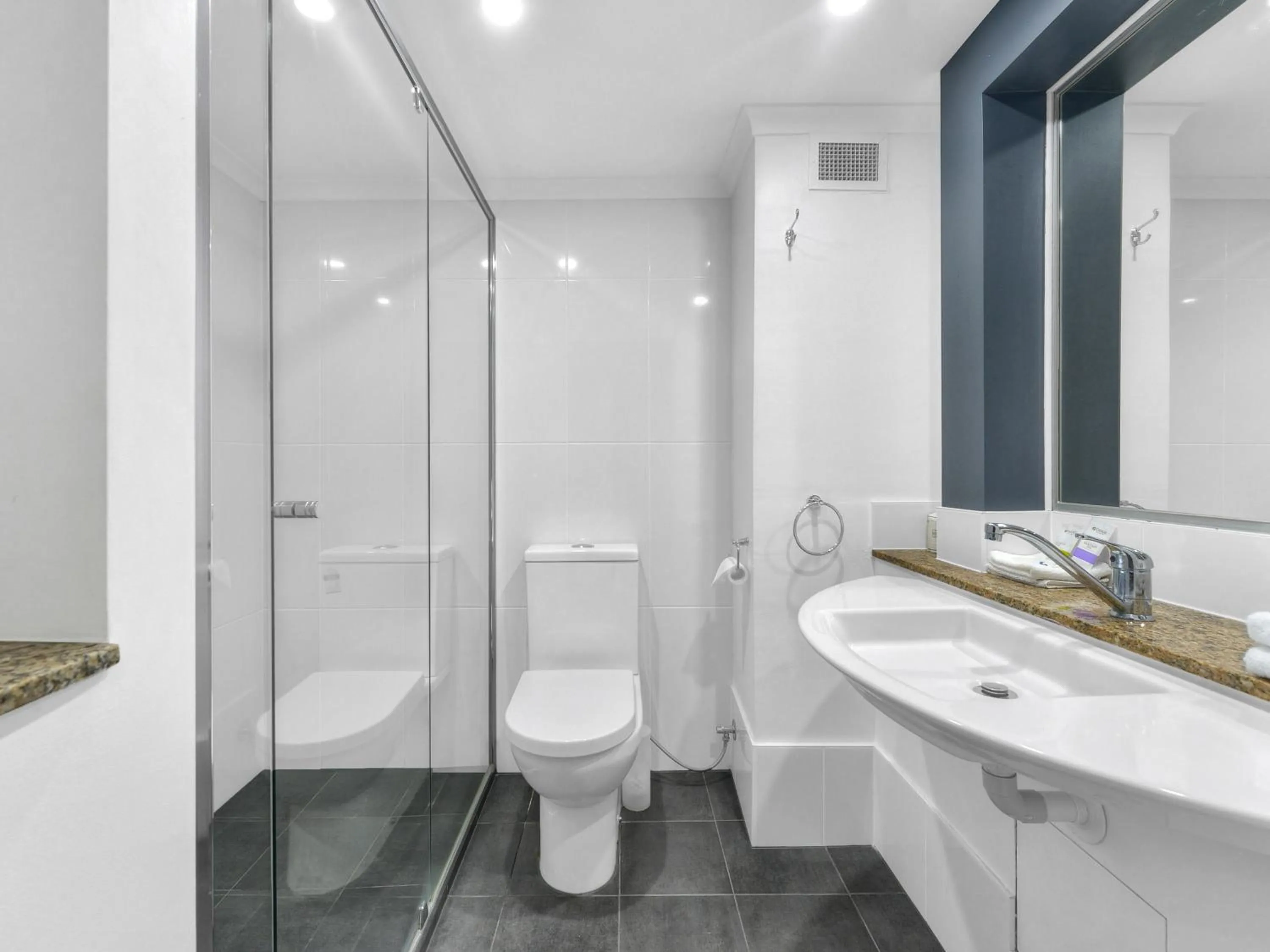 Bathroom in Airport Heritage Motel