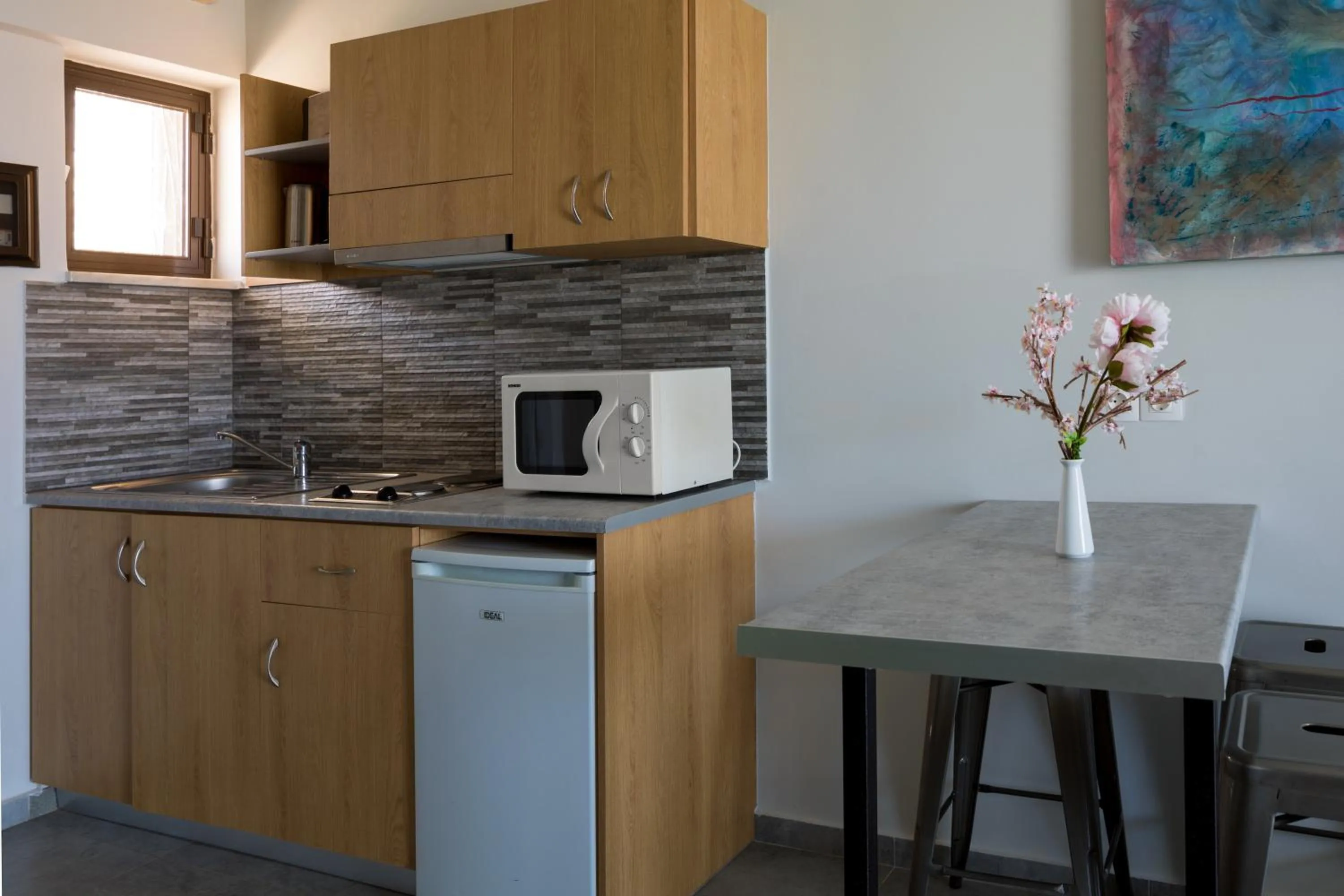 Kitchen or kitchenette in Nireas Hotel