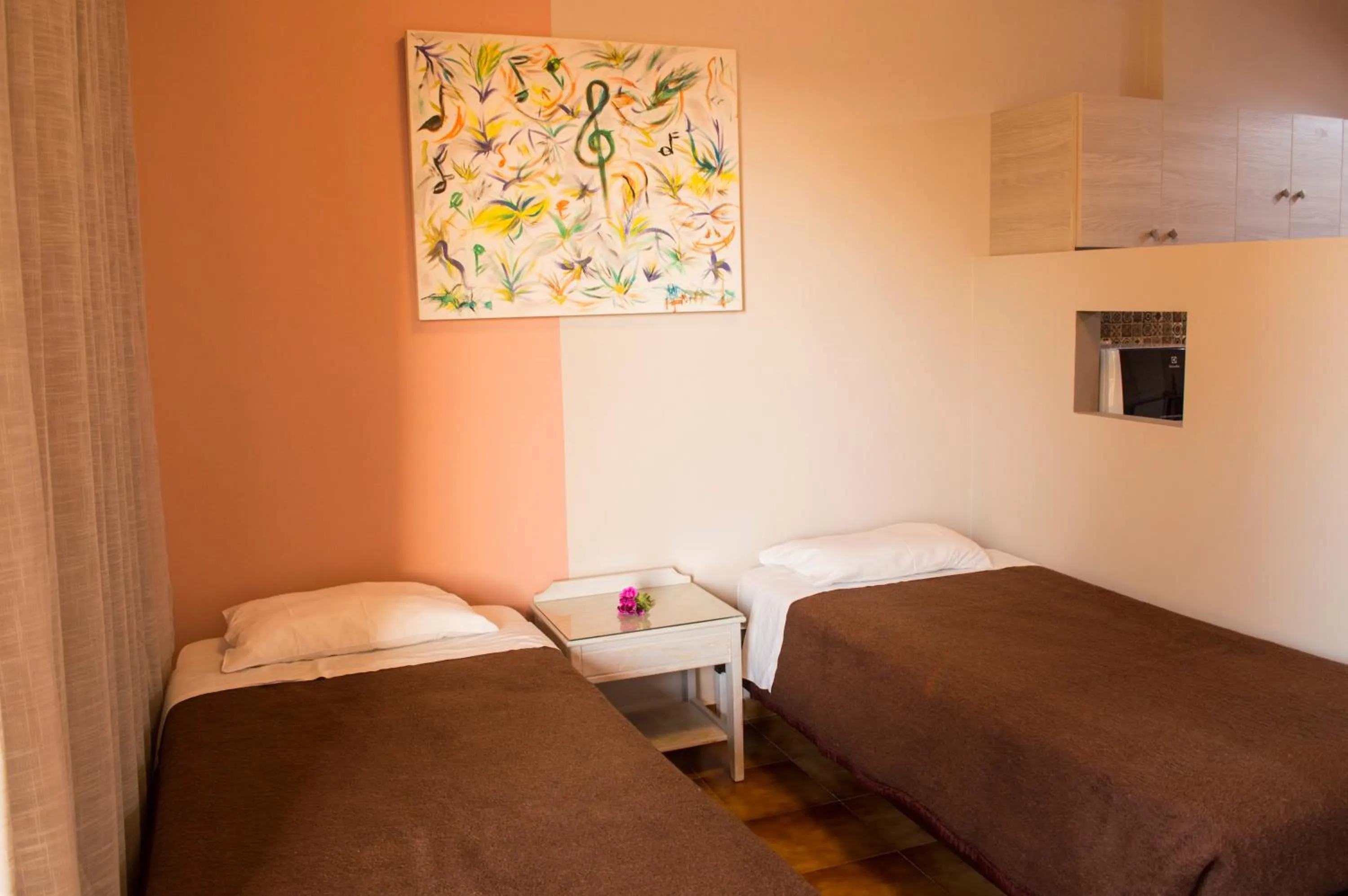 Living room, Bed in Nireas Hotel