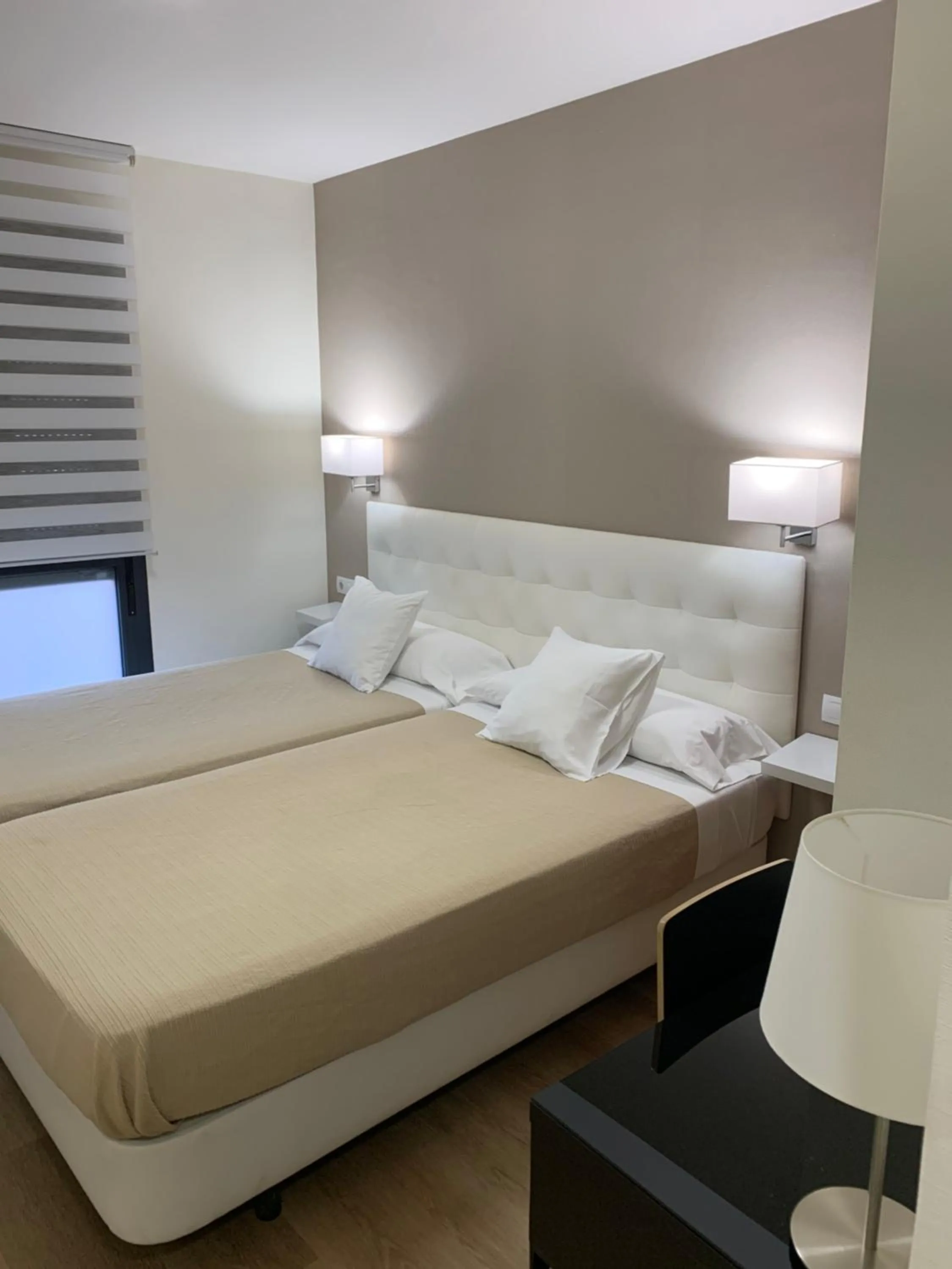 Bed in Hostal el Rocio