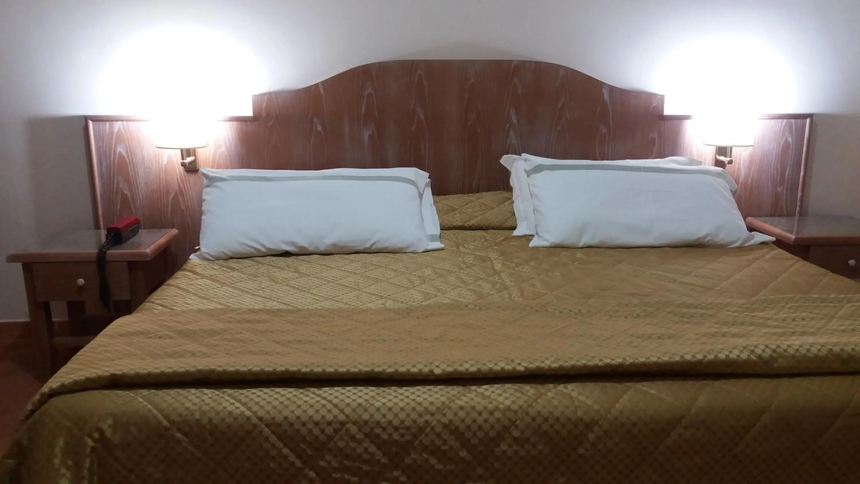 Bed in Grand Hotel Pavone