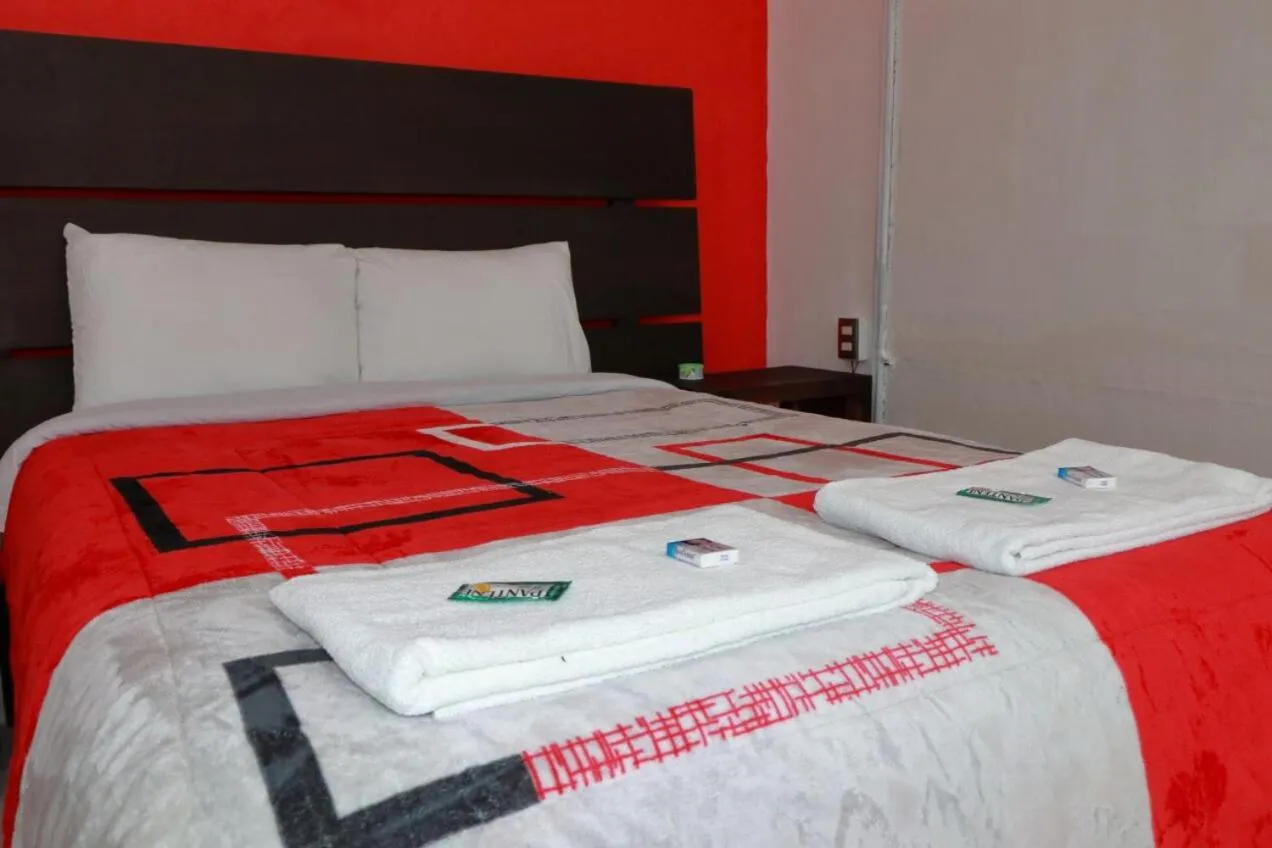 Bed in Hotel Boutique Otomi cerca de Tolantongo