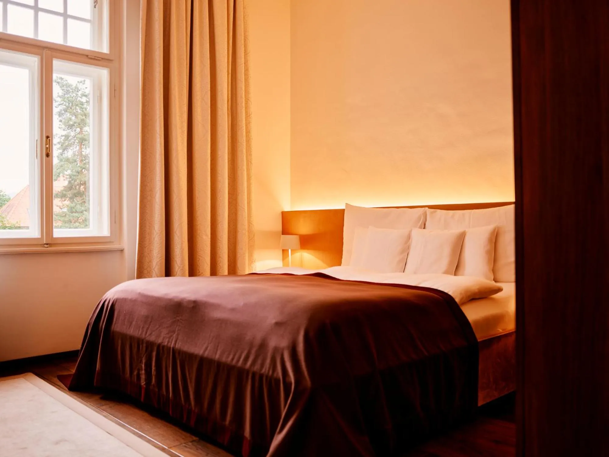 Photo of the whole room, Bed in TAUROA Steirerschlössl