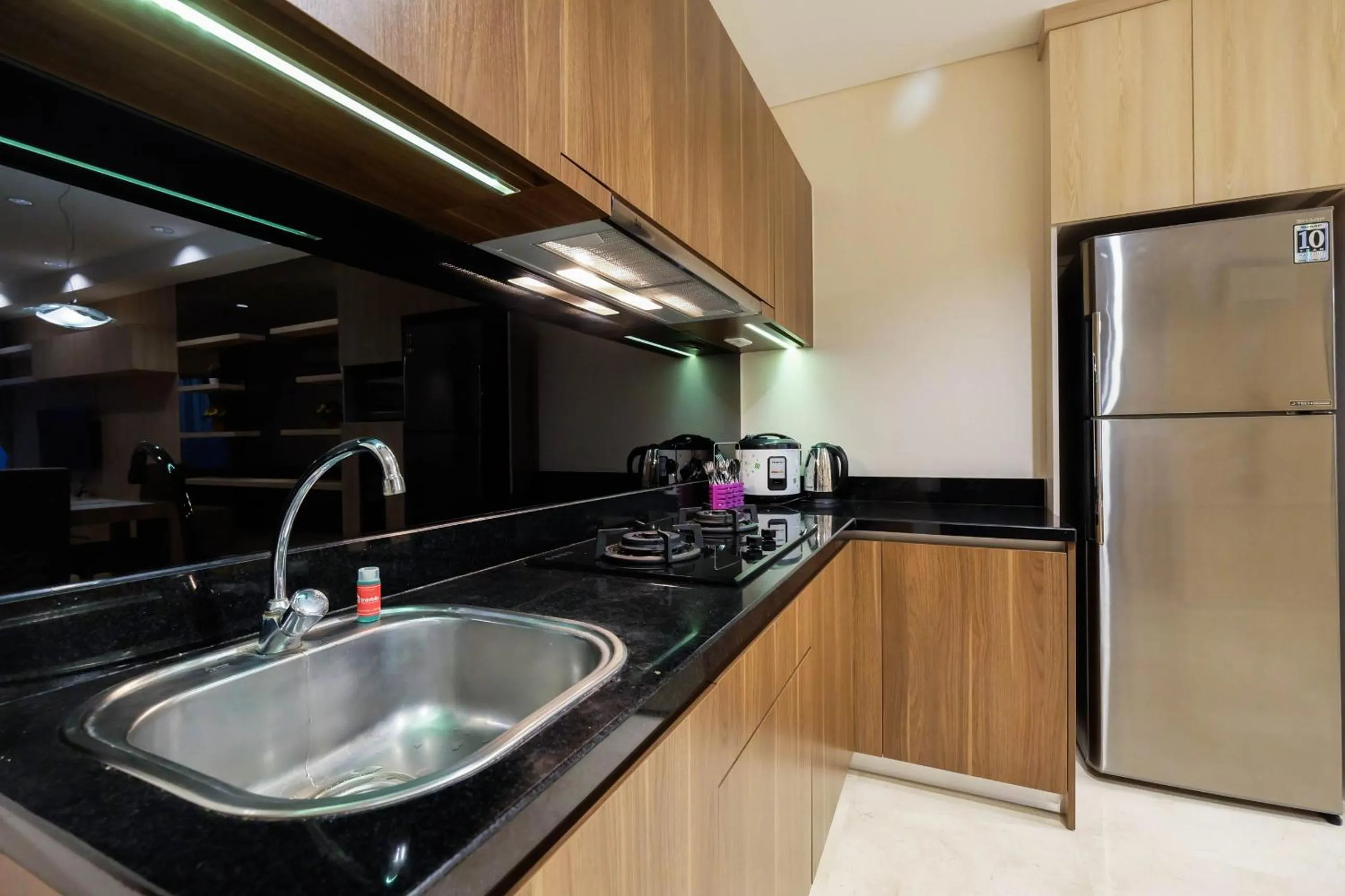 2BR Cozy and Modern L'Avenue Apartment By Travelio