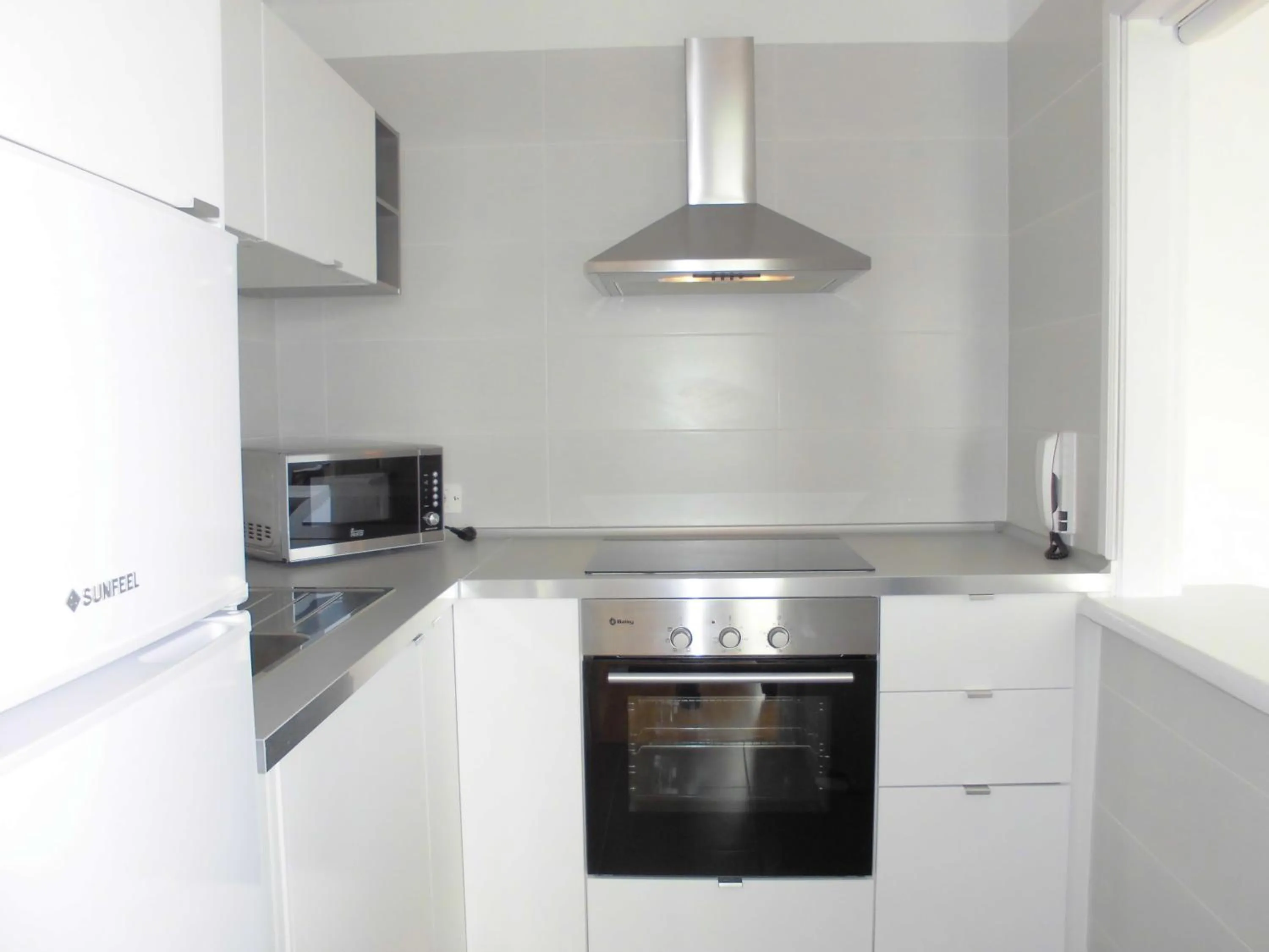 Kitchen or kitchenette in Apartamentos Bruja