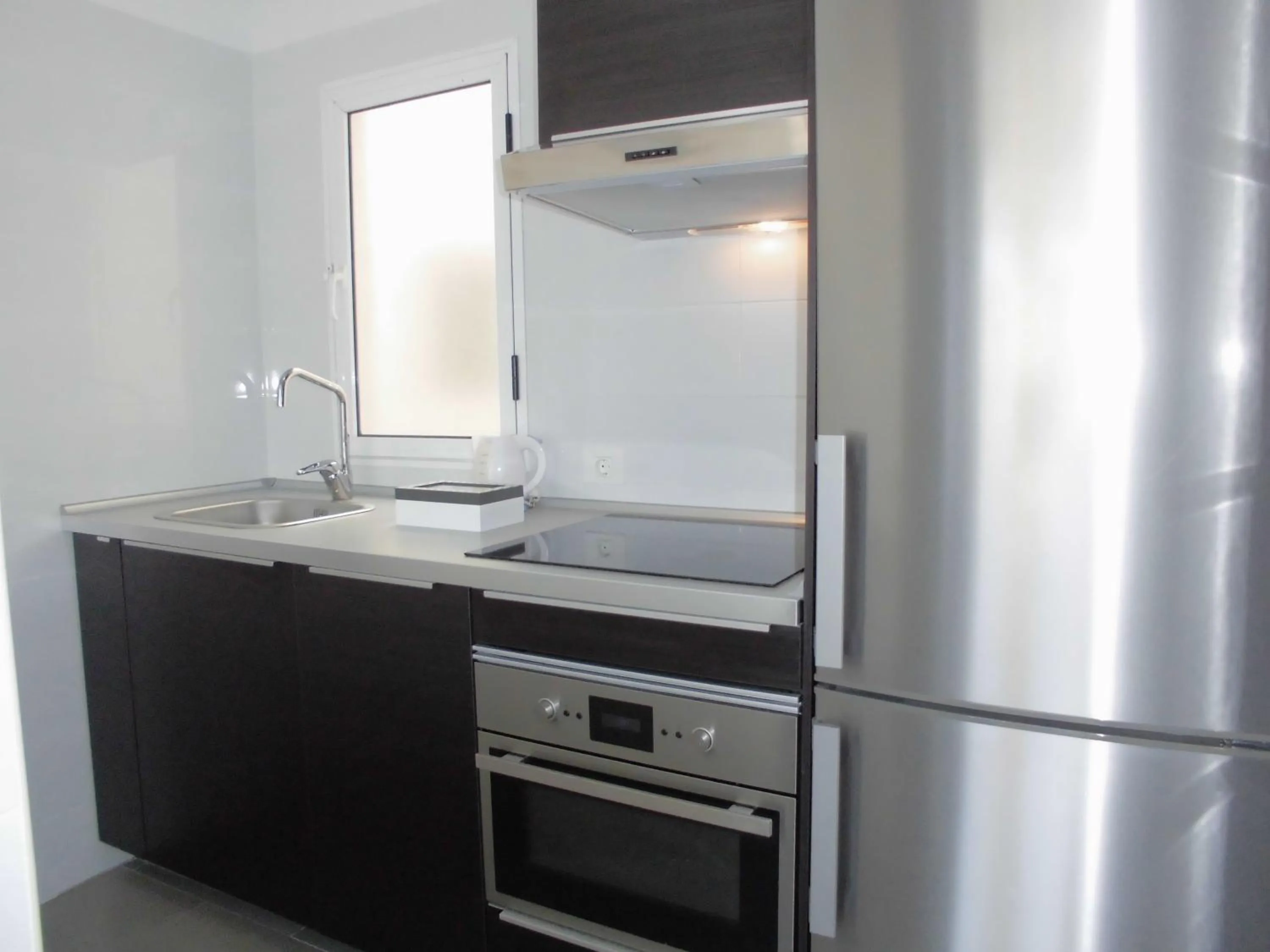 Kitchen or kitchenette in Apartamentos Bruja