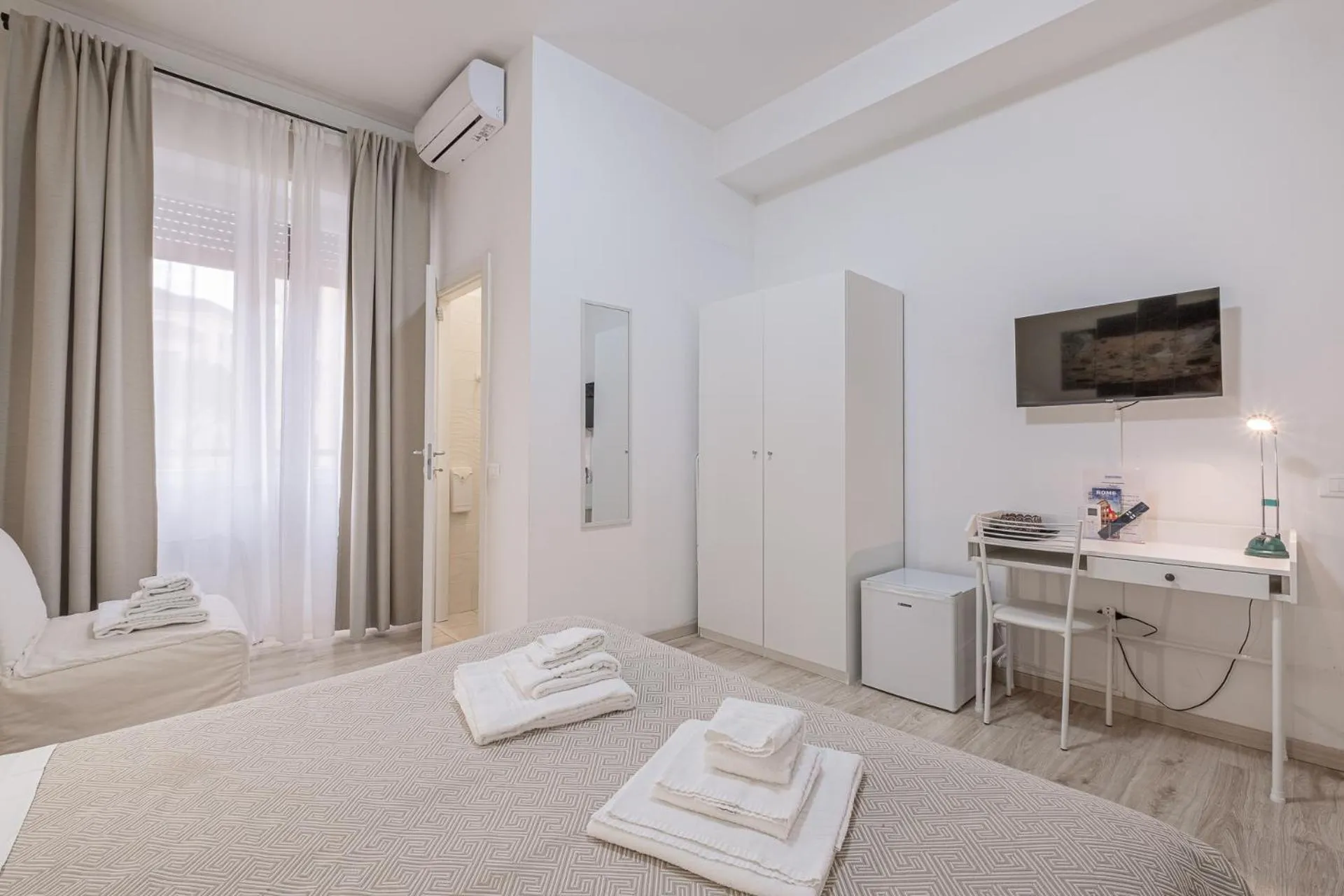 Bed in Damiani & Sister Guesthouse