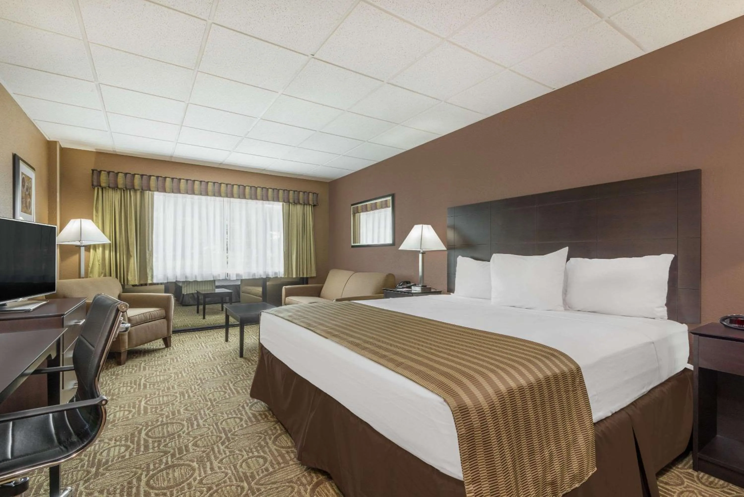 Photo of the whole room, Bed in Ramada by Wyndham Paintsville Hotel & Conference Center
