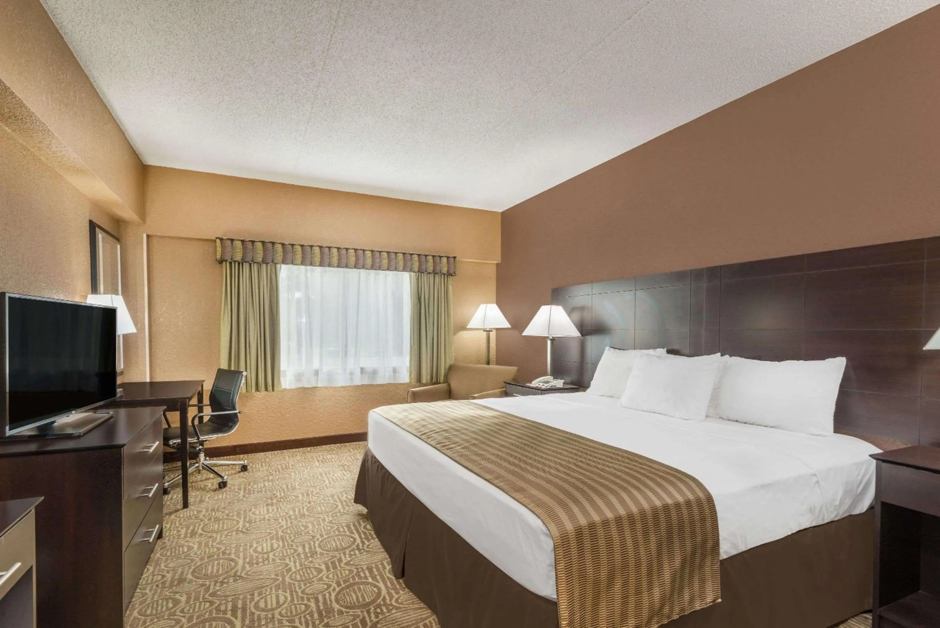 Photo of the whole room, Bed in Ramada by Wyndham Paintsville Hotel & Conference Center