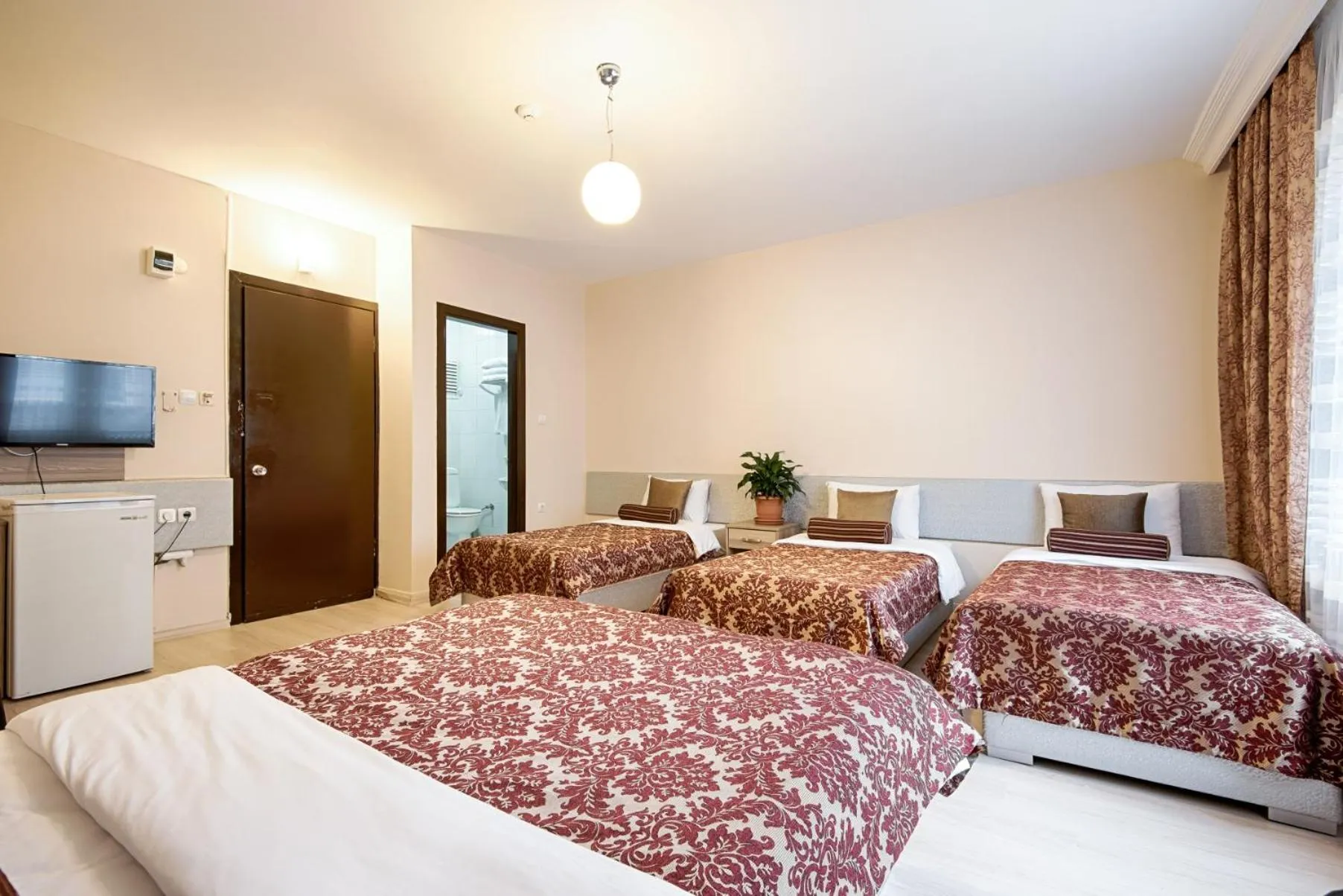 Photo of the whole room, Bed in DİNAR HOTEL