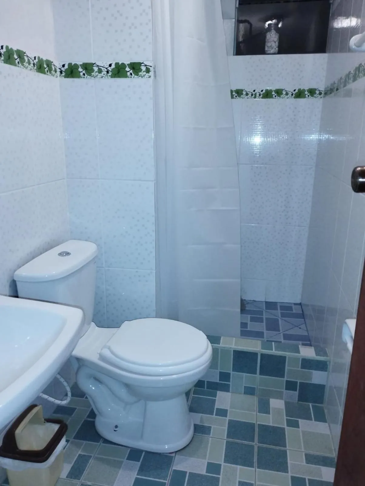 Shower in Huaytusive Inn Hotel