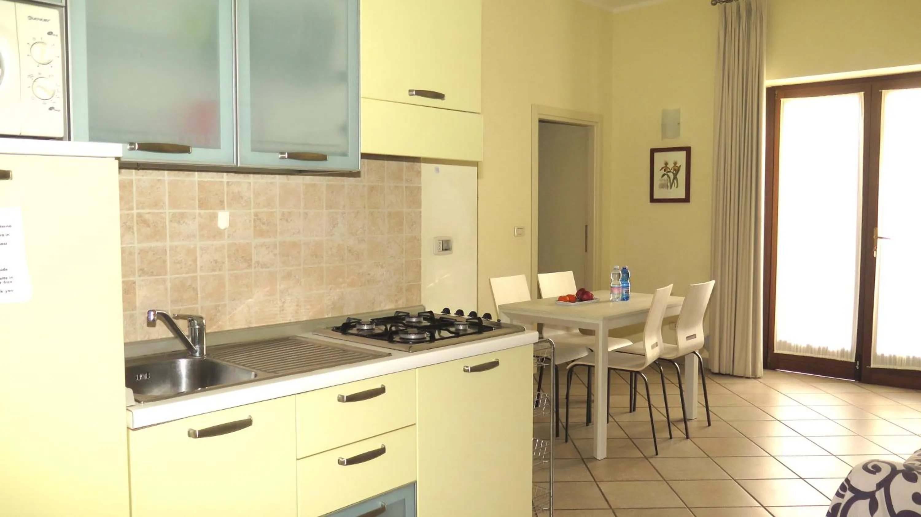 Kitchen or kitchenette in Residenza Turistico Alberghiera Corallo