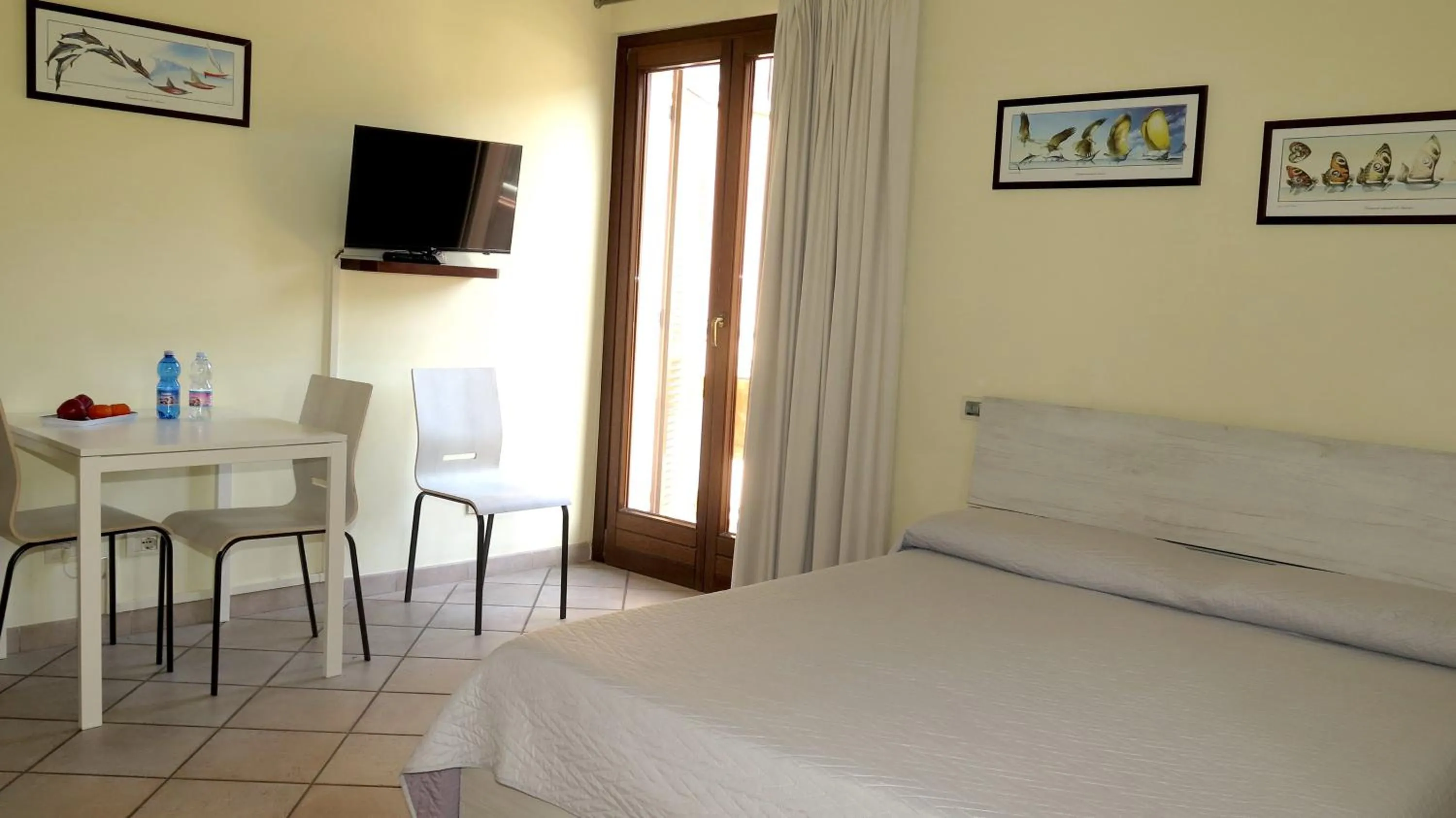 Photo of the whole room, Bed in Residenza Turistico Alberghiera Corallo