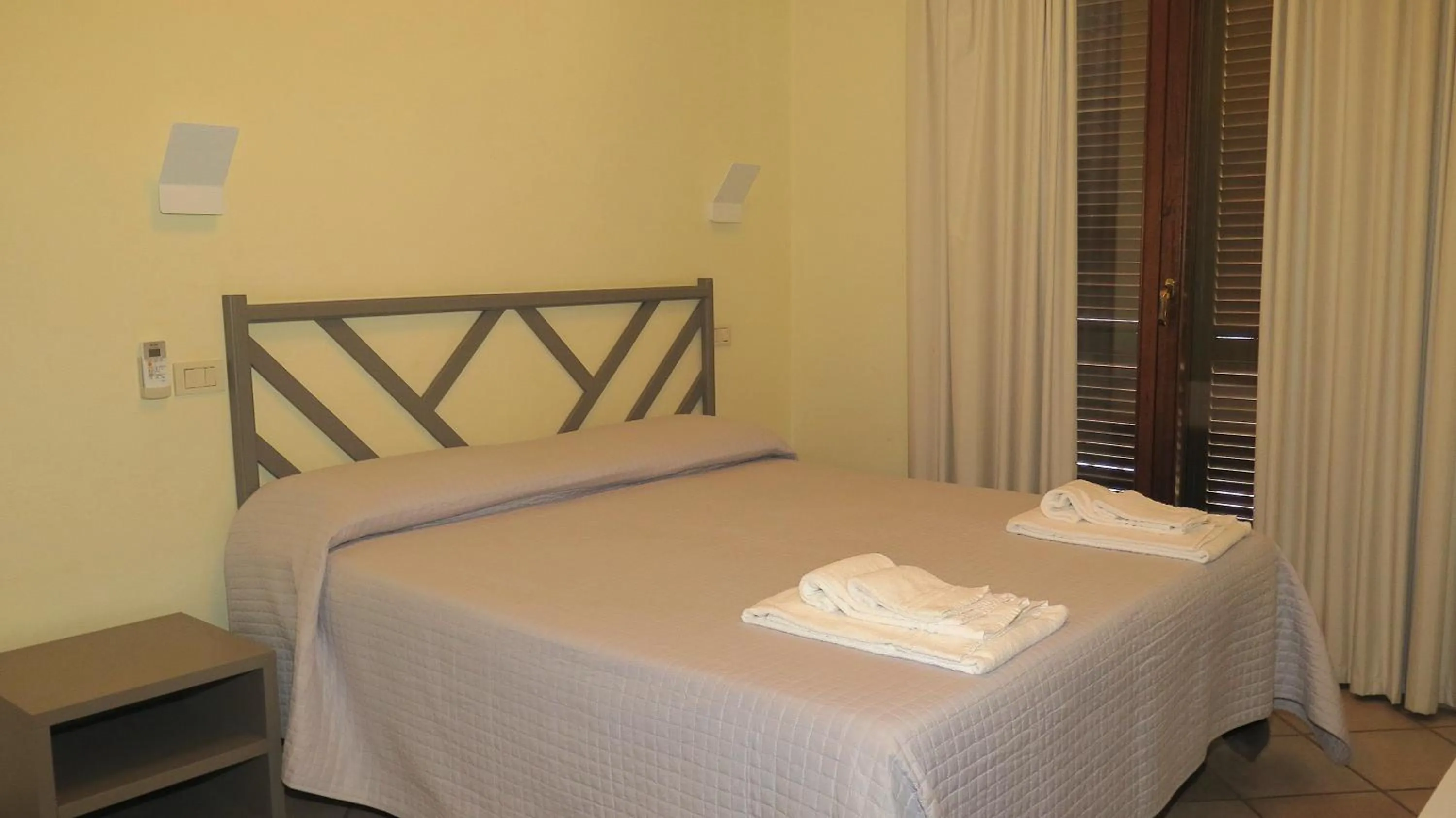 Photo of the whole room, Bed in Residenza Turistico Alberghiera Corallo