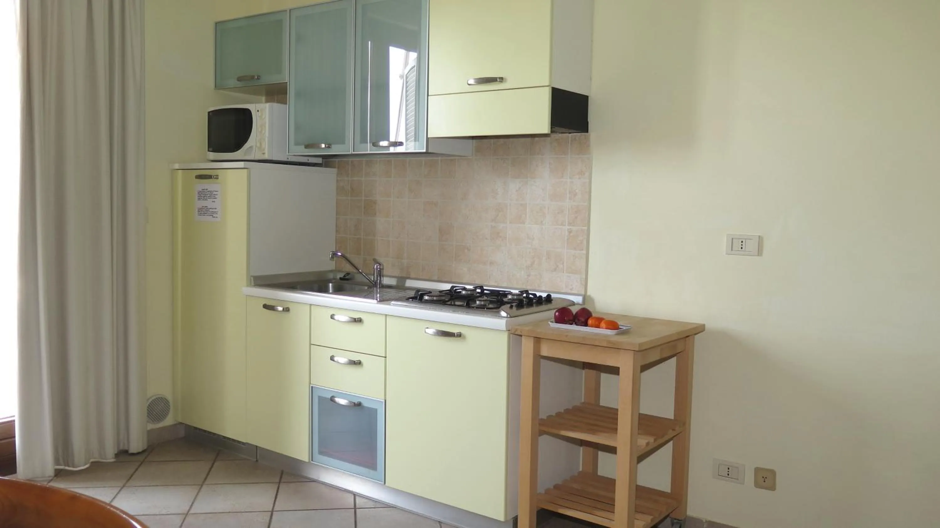 Kitchen or kitchenette in Residenza Turistico Alberghiera Corallo