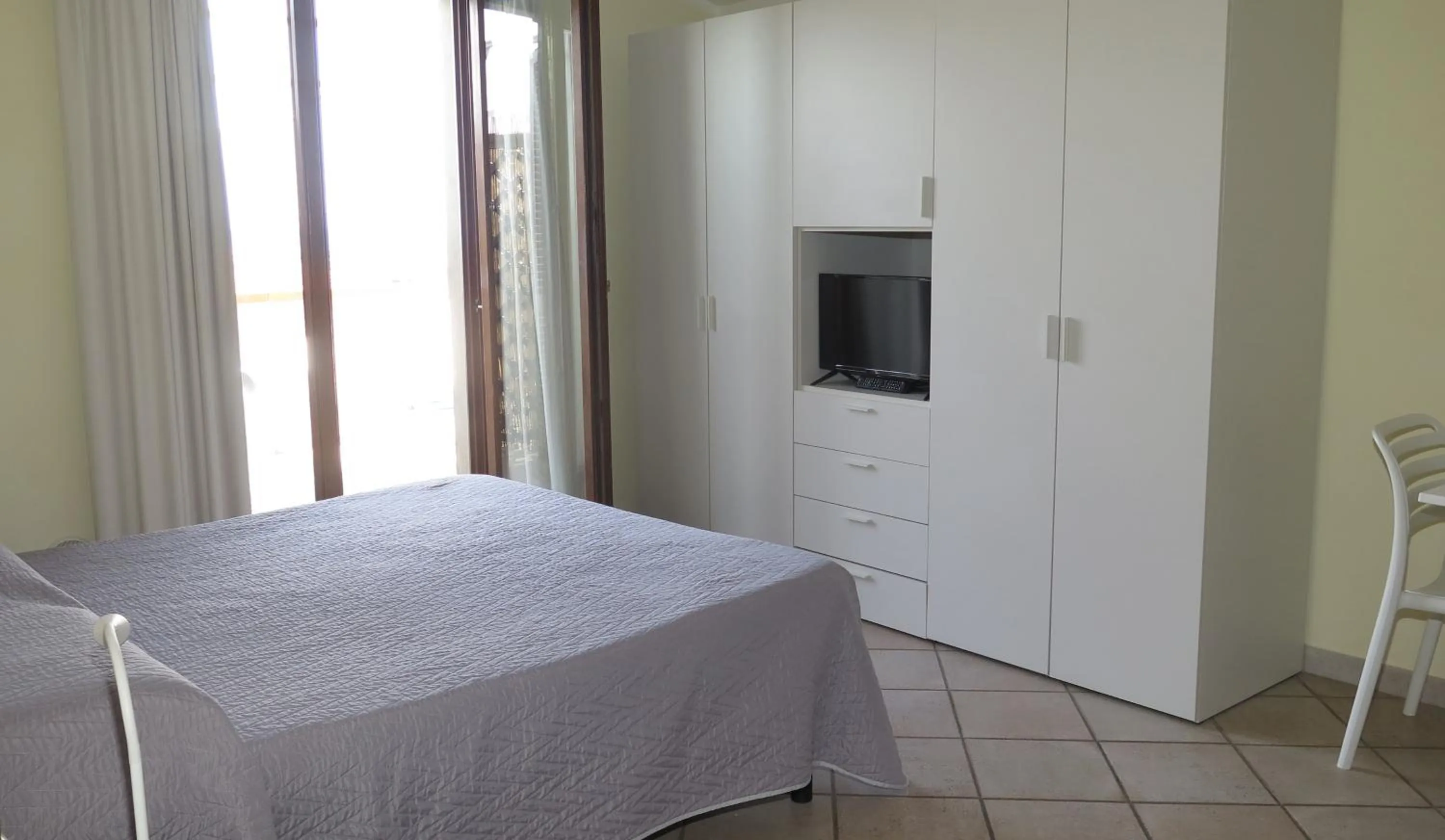 Photo of the whole room, Bed in Residenza Turistico Alberghiera Corallo