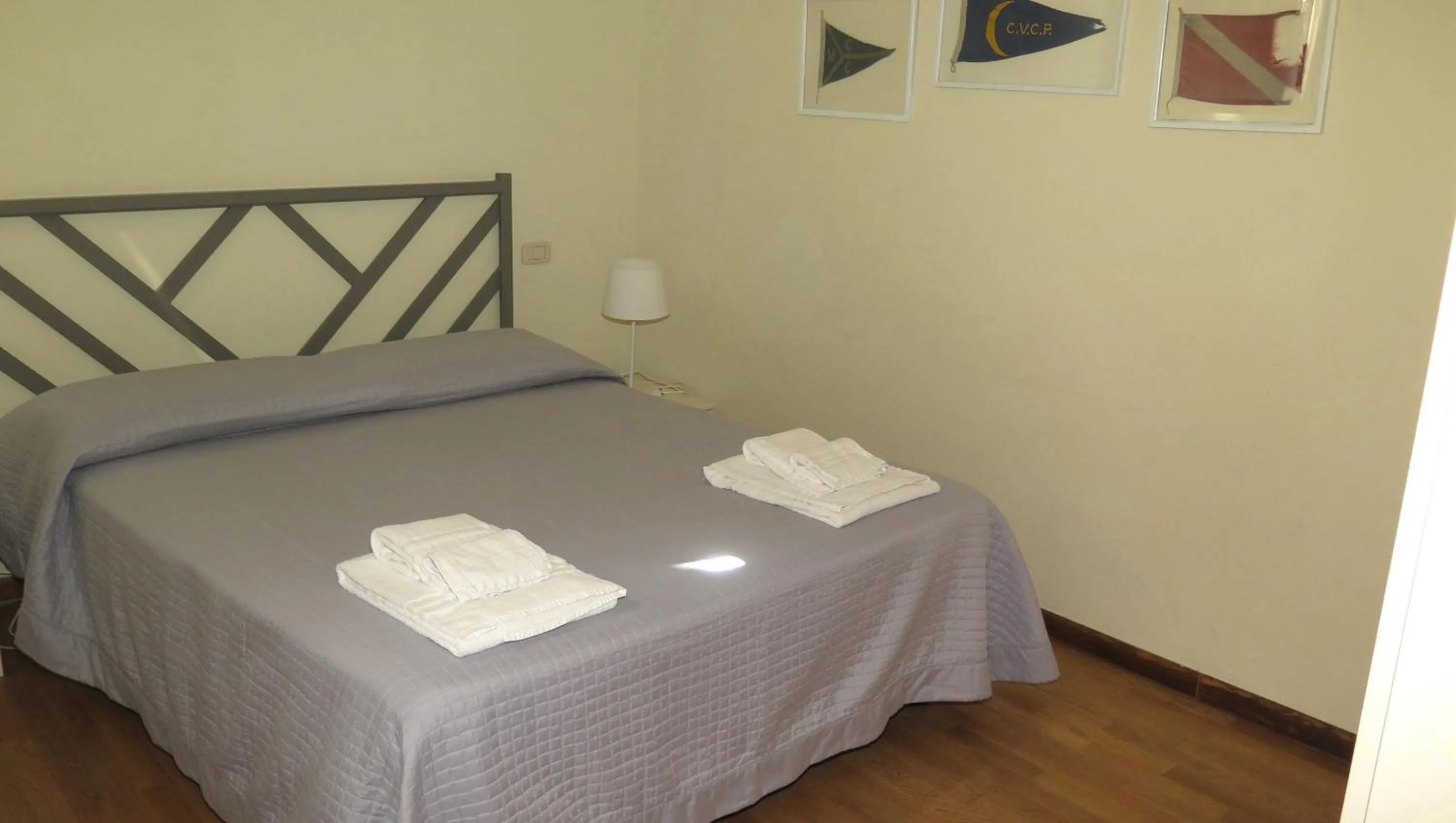 Bedroom, Bed in Residenza Turistico Alberghiera Corallo