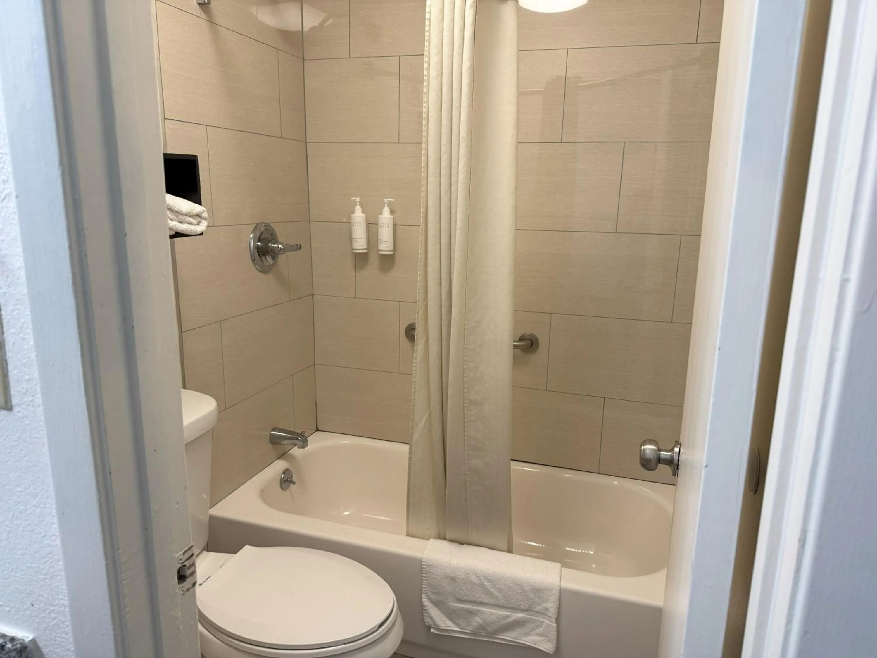 Bathroom in Super 8 by Wyndham Monticello AR