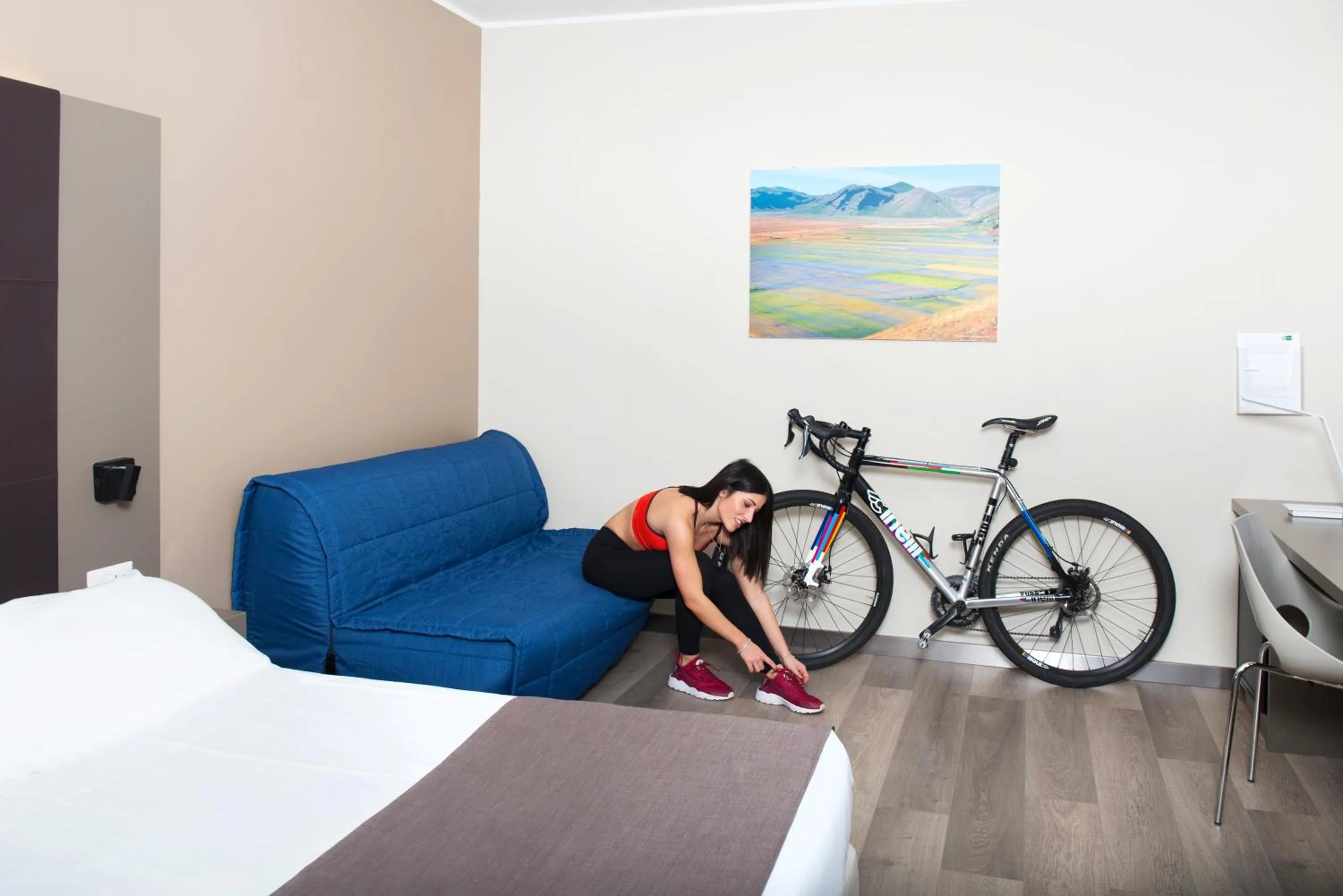 Bed in City Hotel & Suites