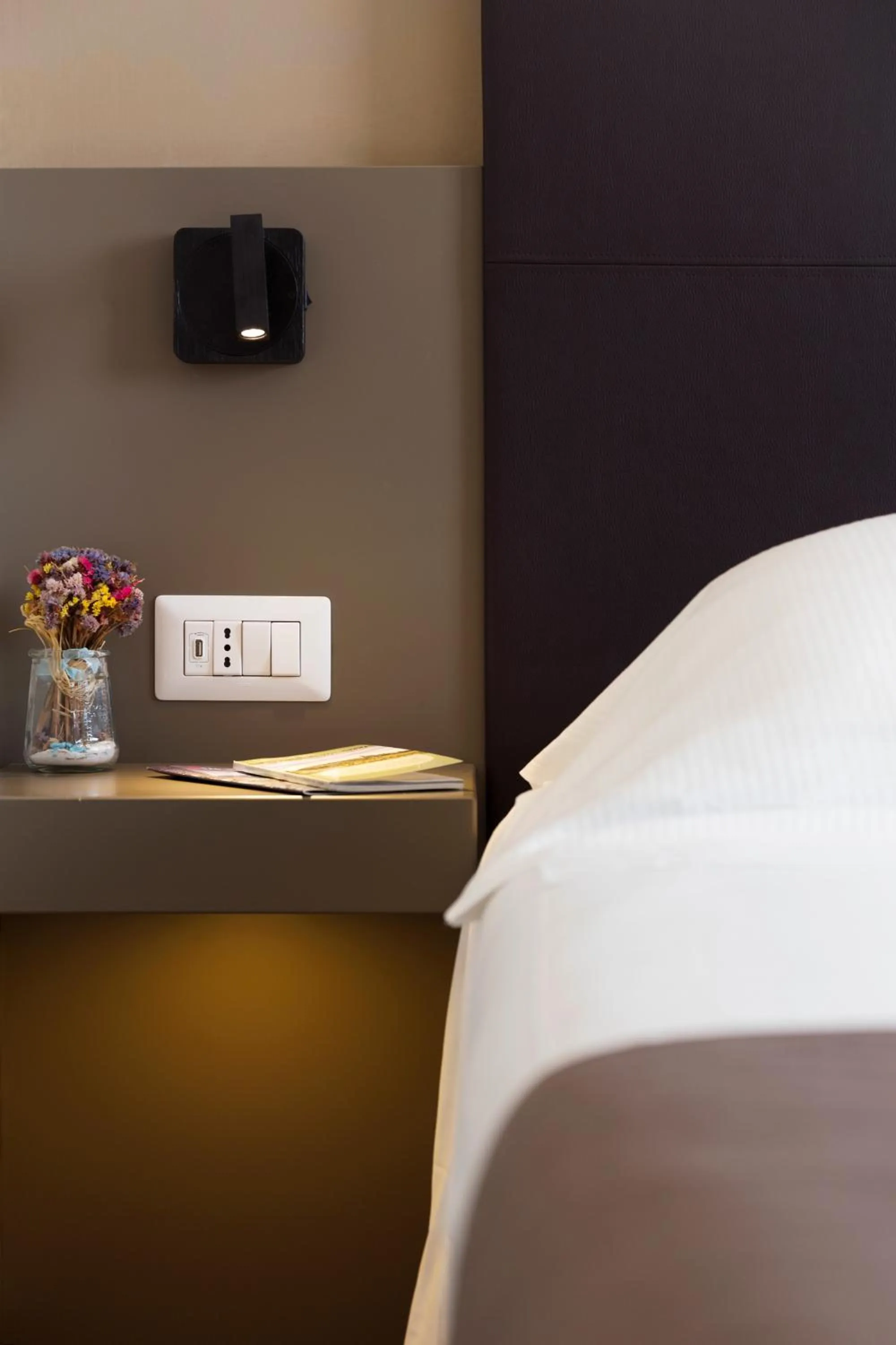 Bed in City Hotel & Suites