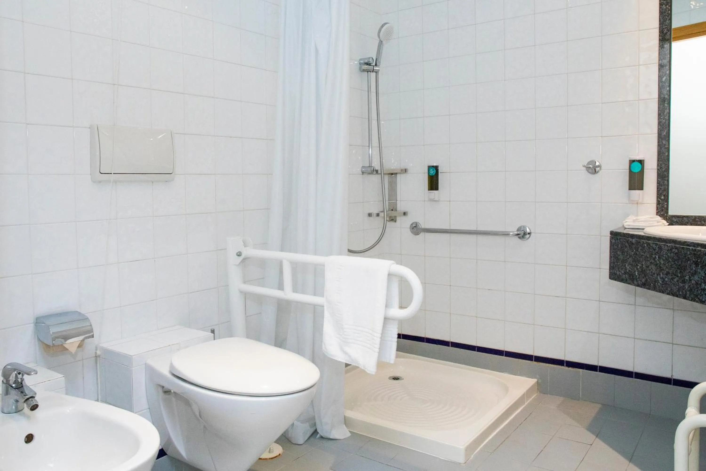 Bathroom in City Hotel & Suites