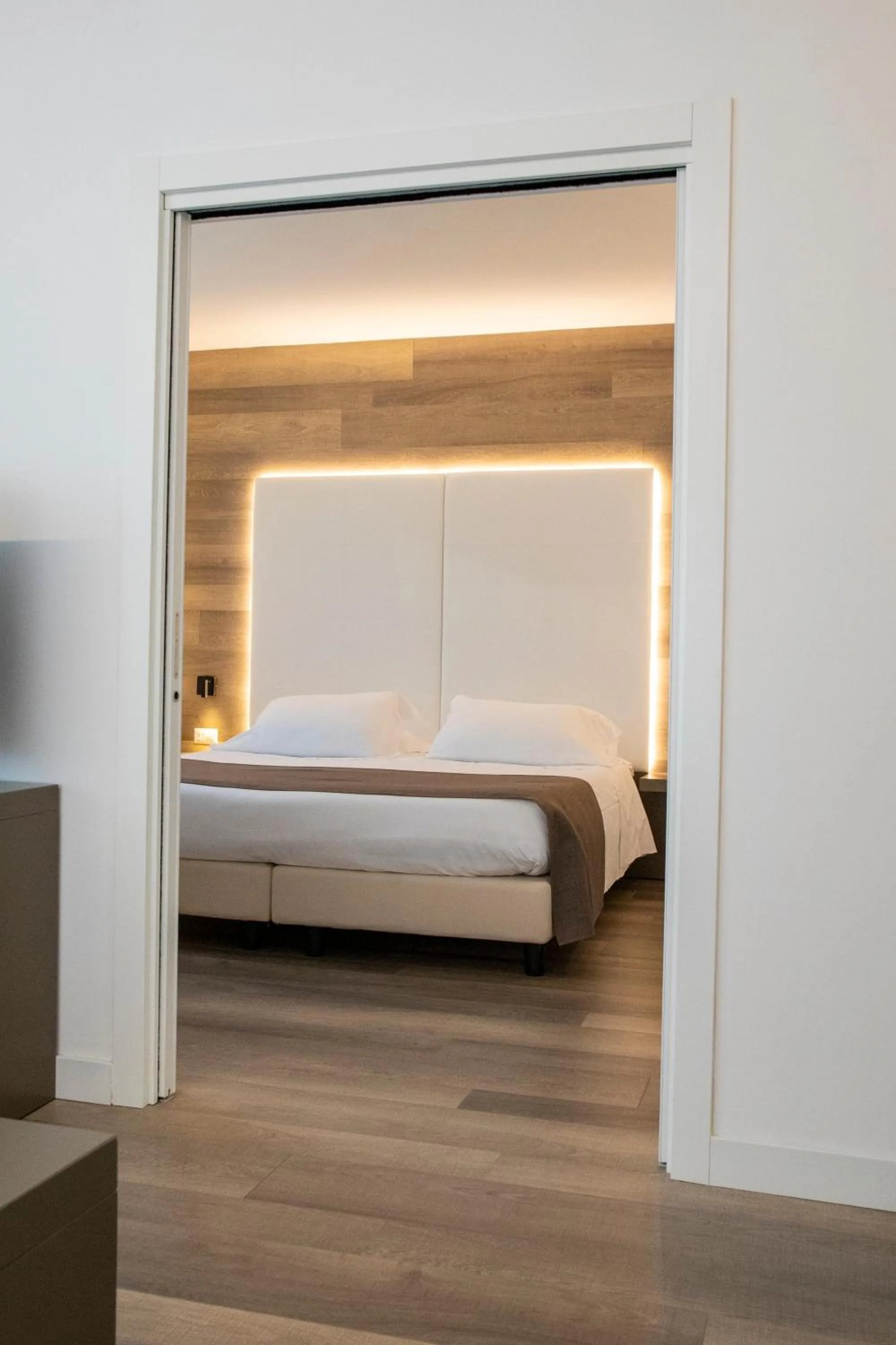 Bed in City Hotel & Suites