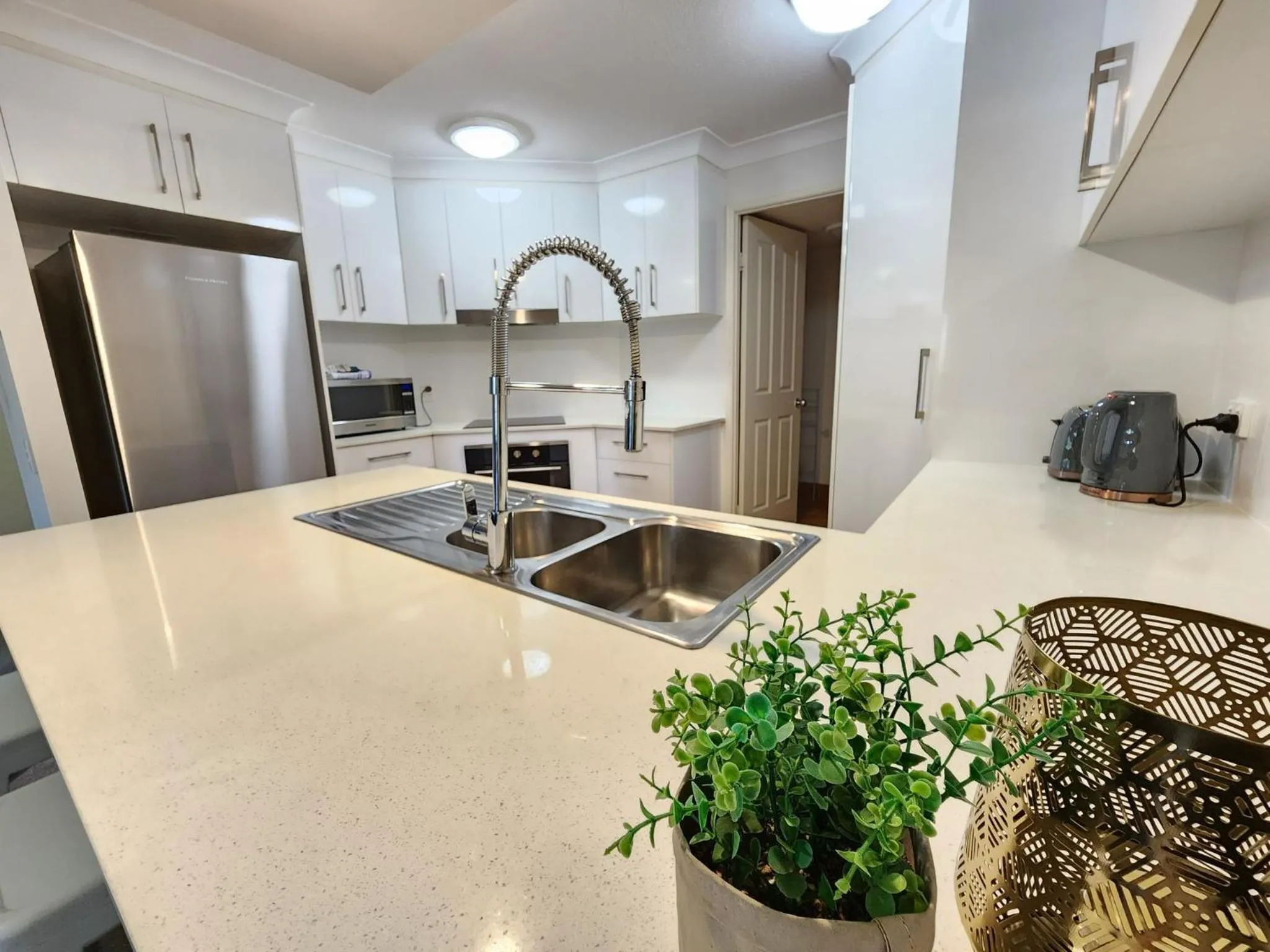 Kitchen or kitchenette in Fairways Golf & Beach Retreat Bribie Island