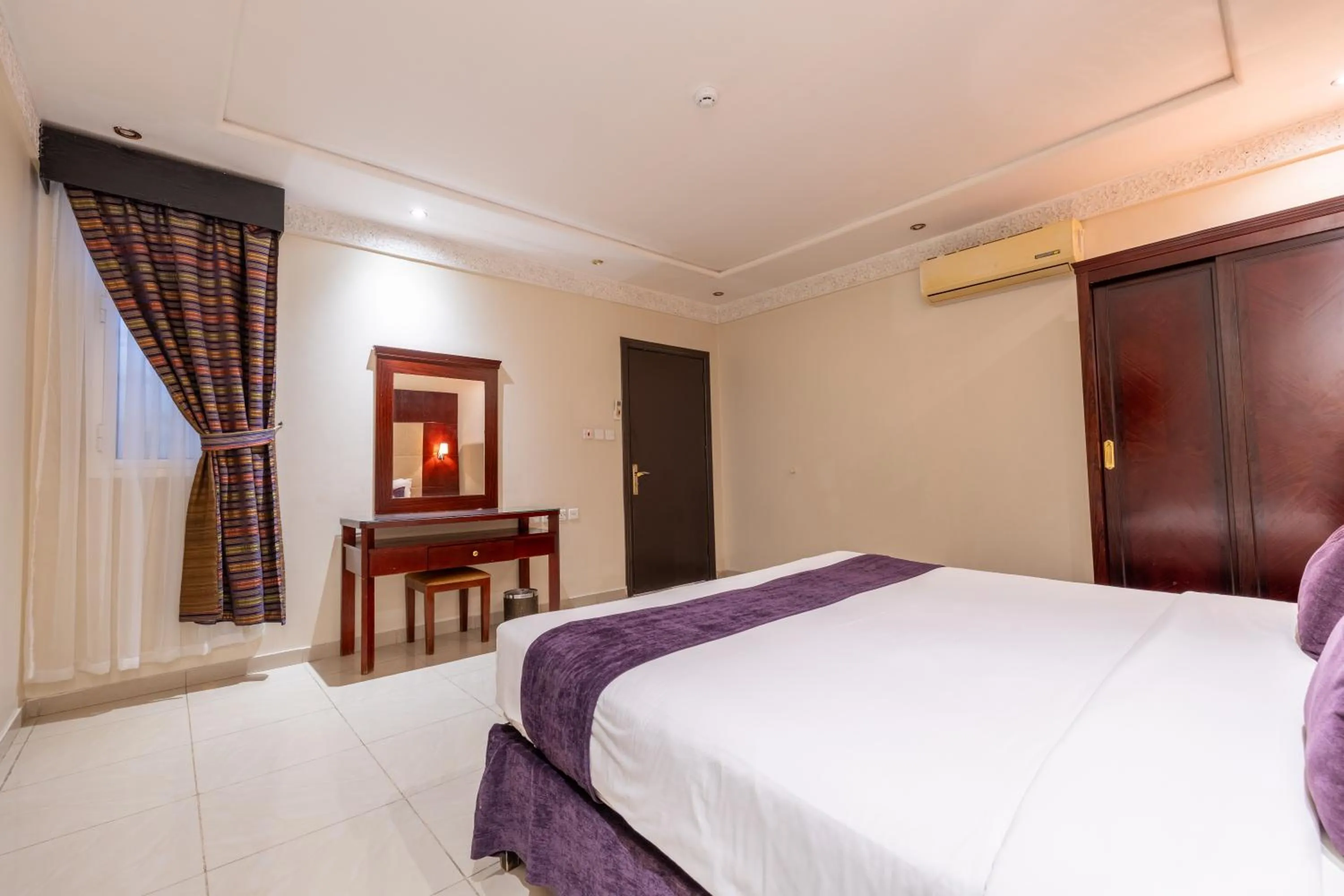 Bed in Dar NEYAARA SERVICED APARTMENTS
