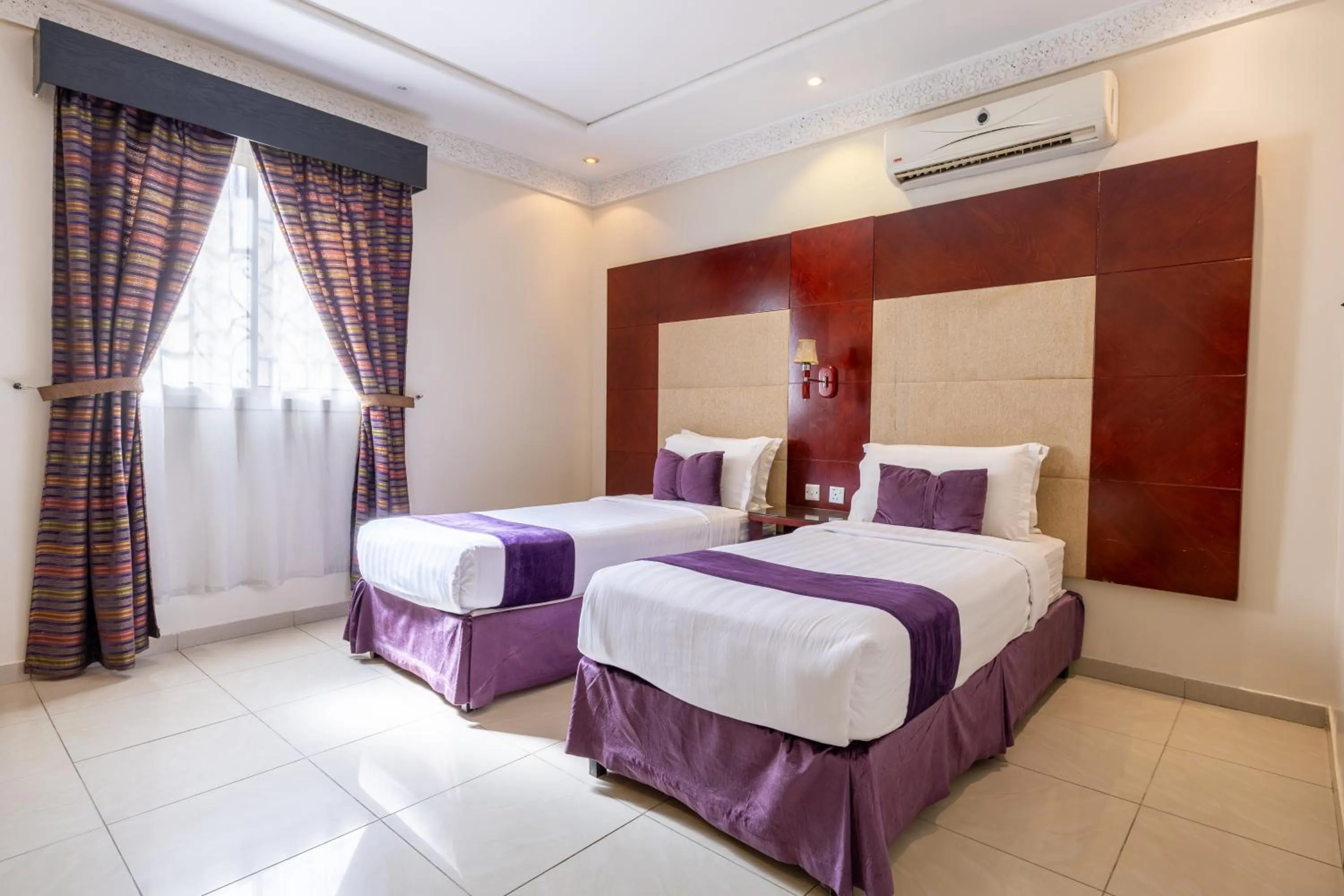 Bed in Dar NEYAARA SERVICED APARTMENTS