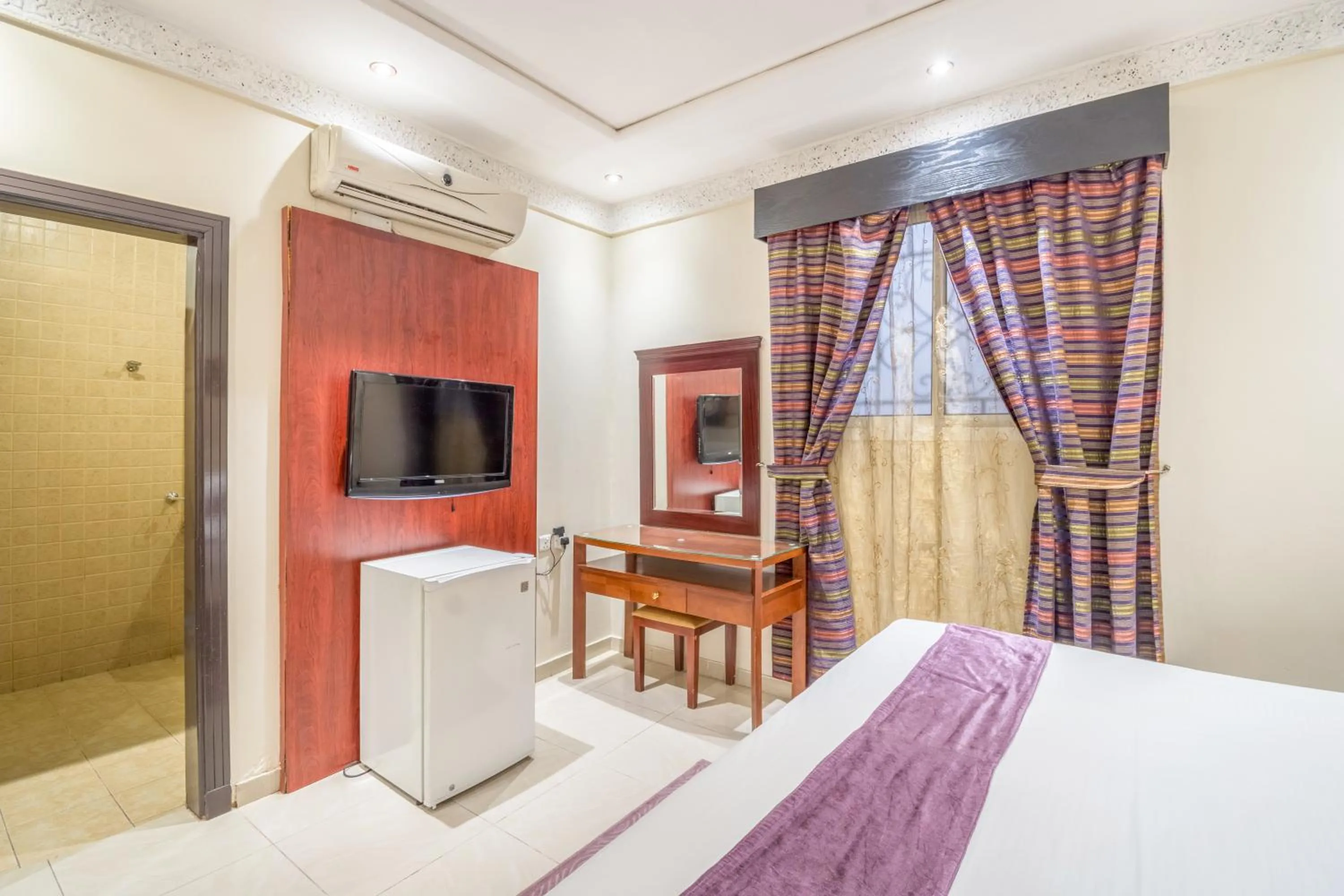 Bed in Dar NEYAARA SERVICED APARTMENTS