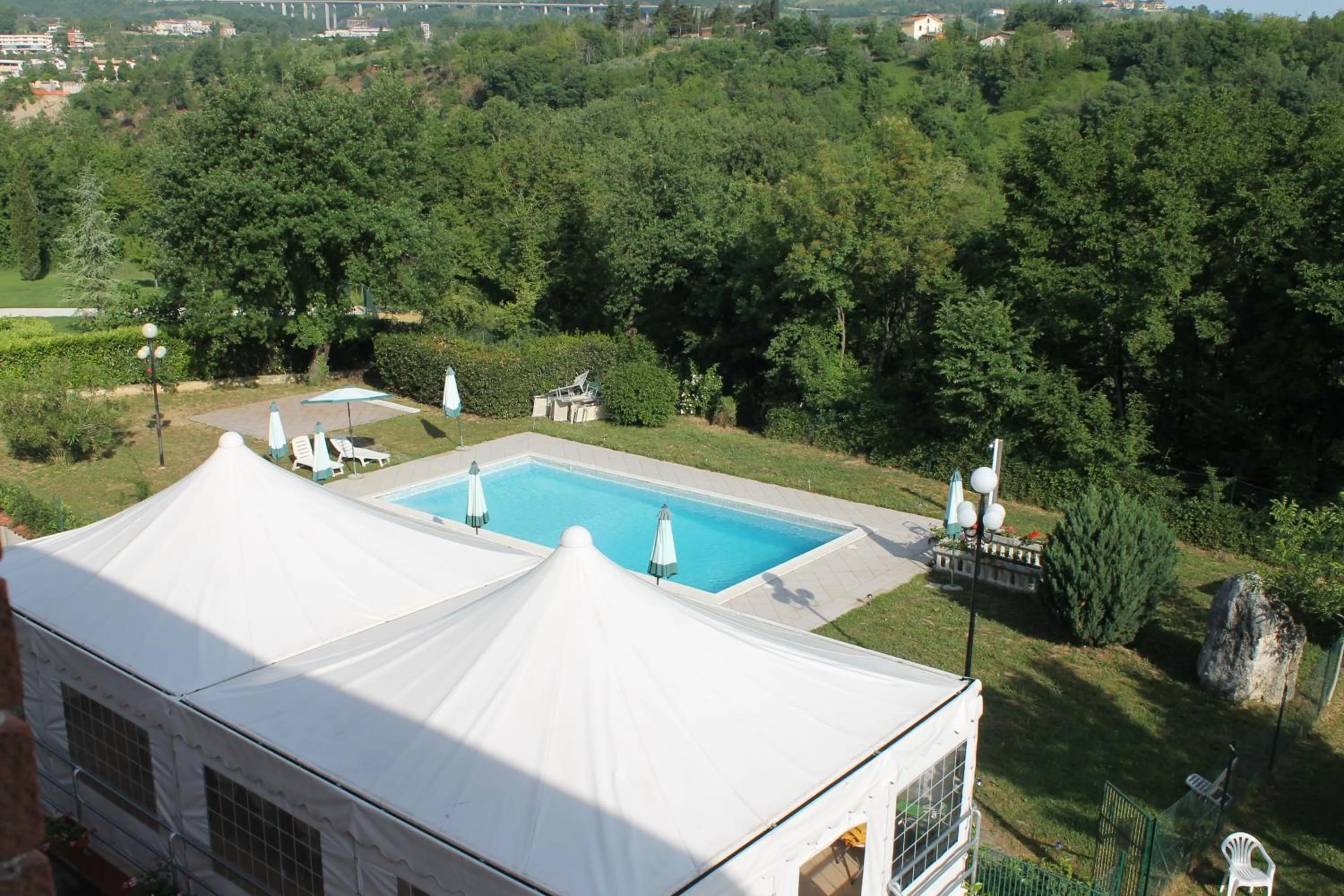Pool view in Residence La Piscina
