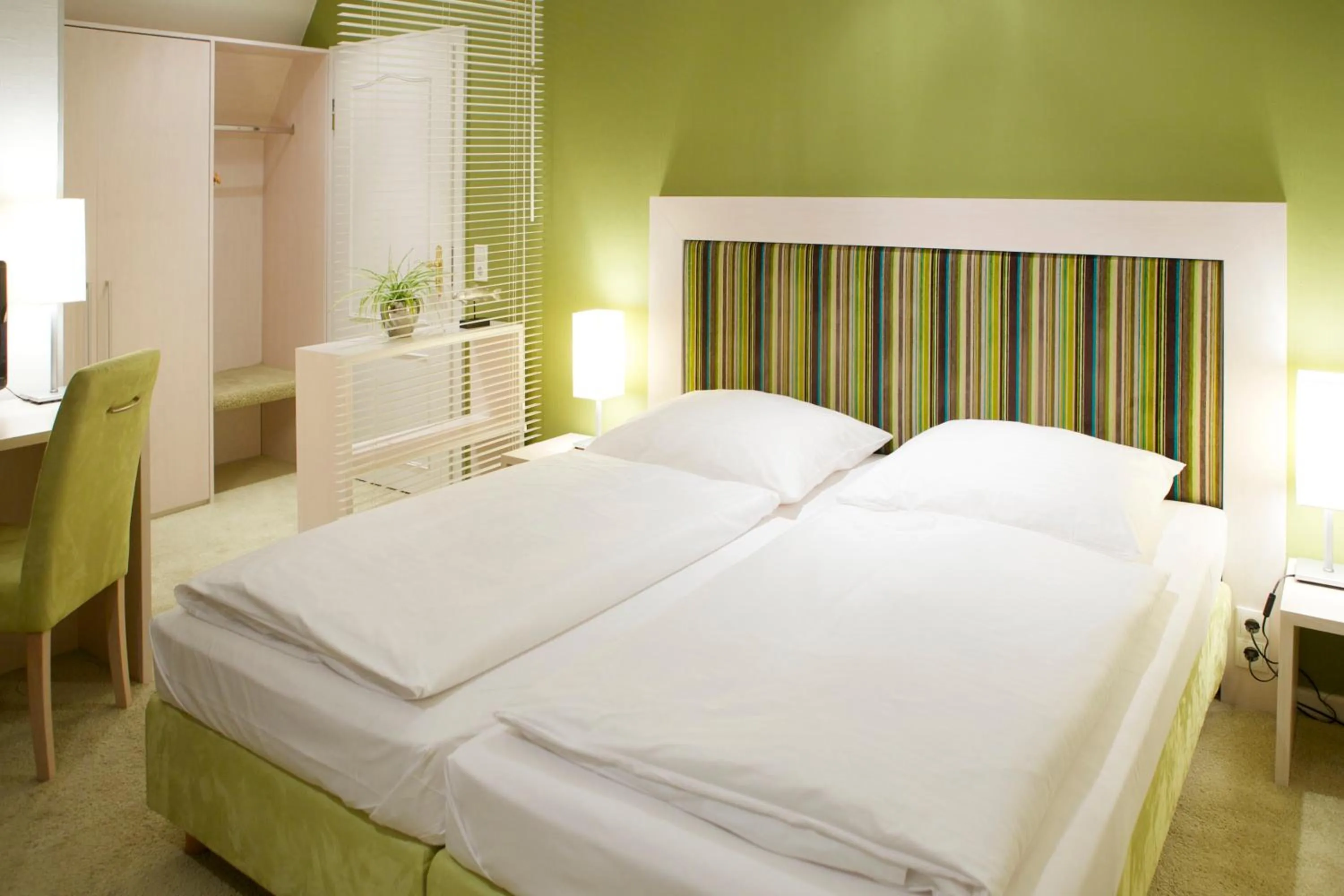 Photo of the whole room, Bed in Hotel und Spa Lundenbergsand