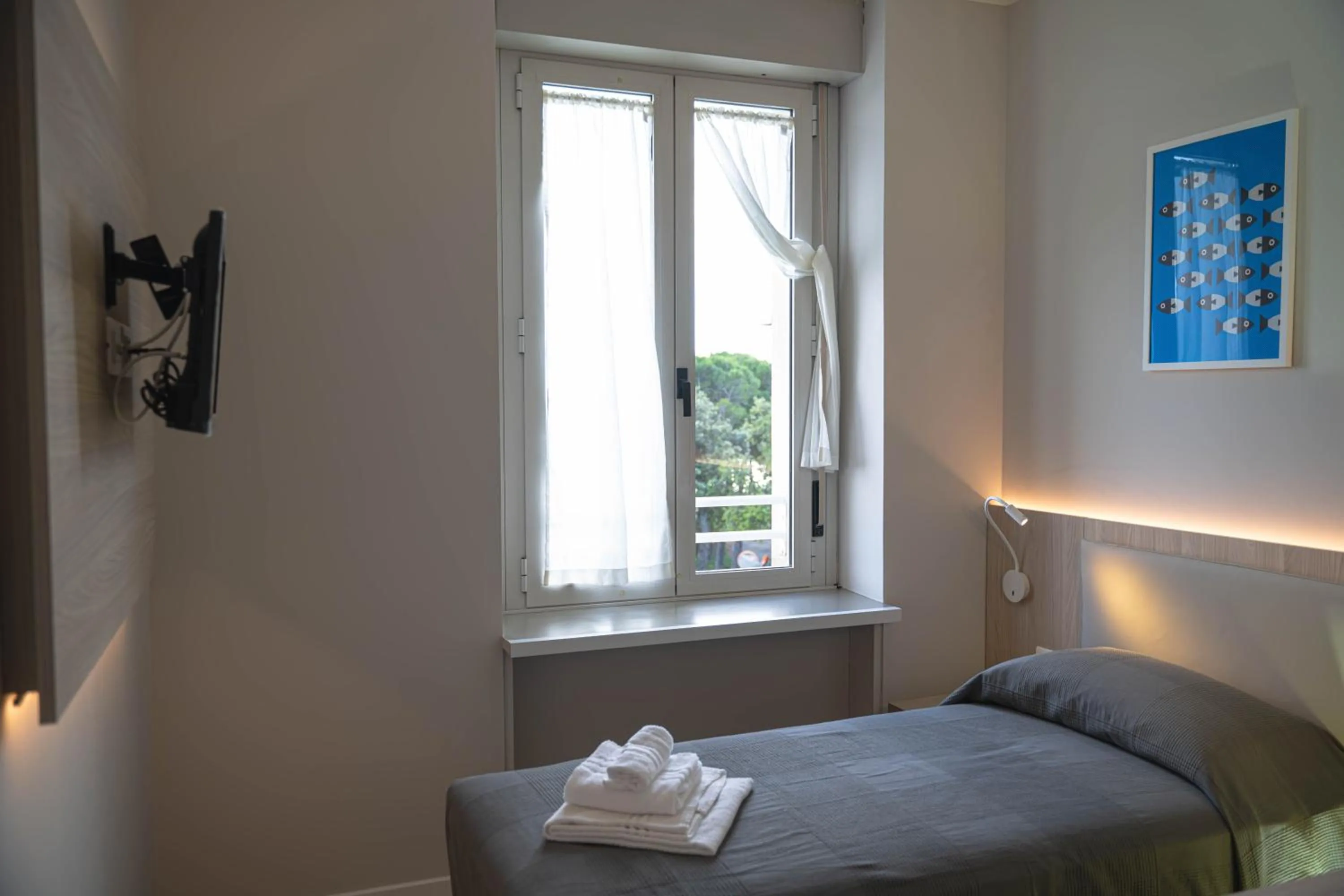 Bed in Hotel Tritone