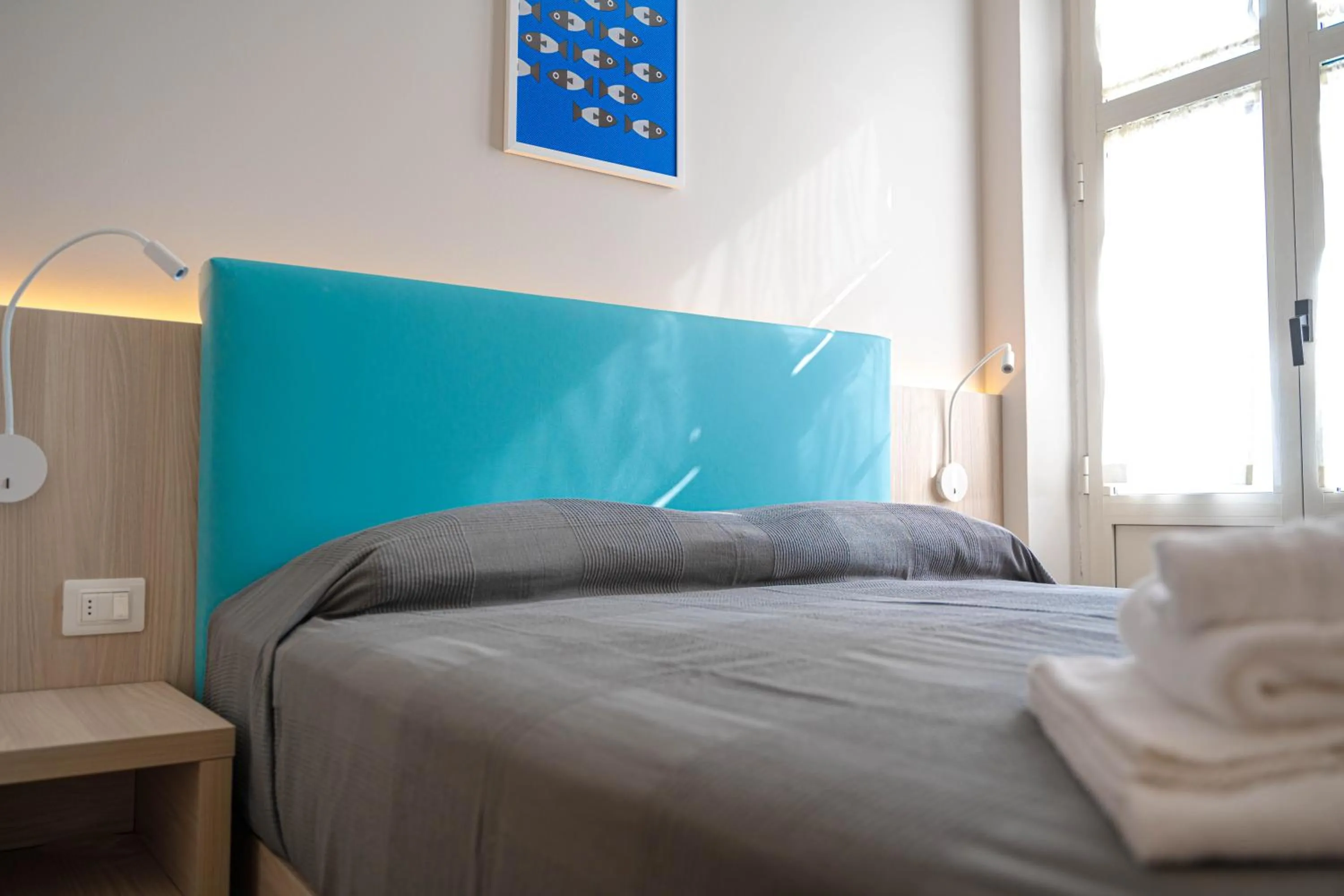 Bed in Hotel Tritone