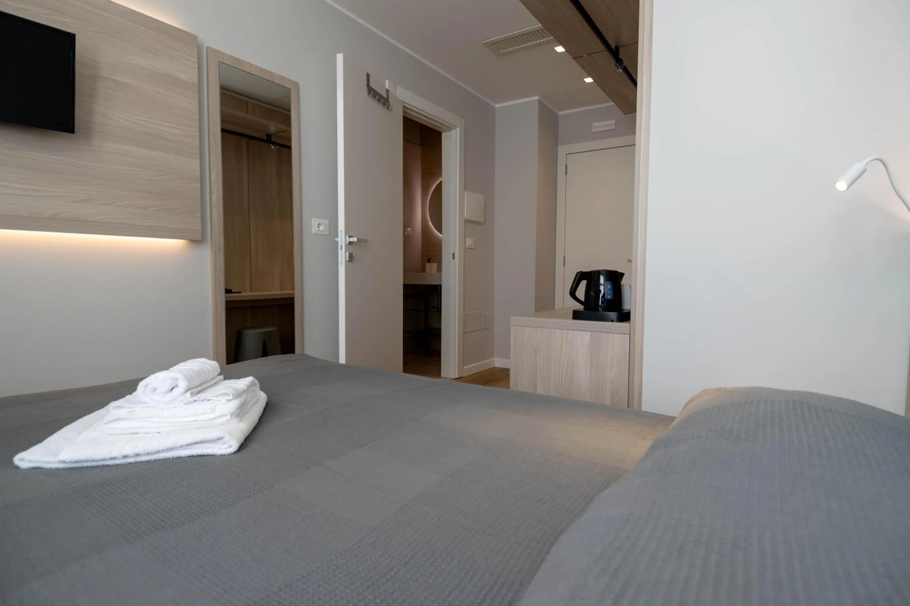 Bed in Hotel Tritone