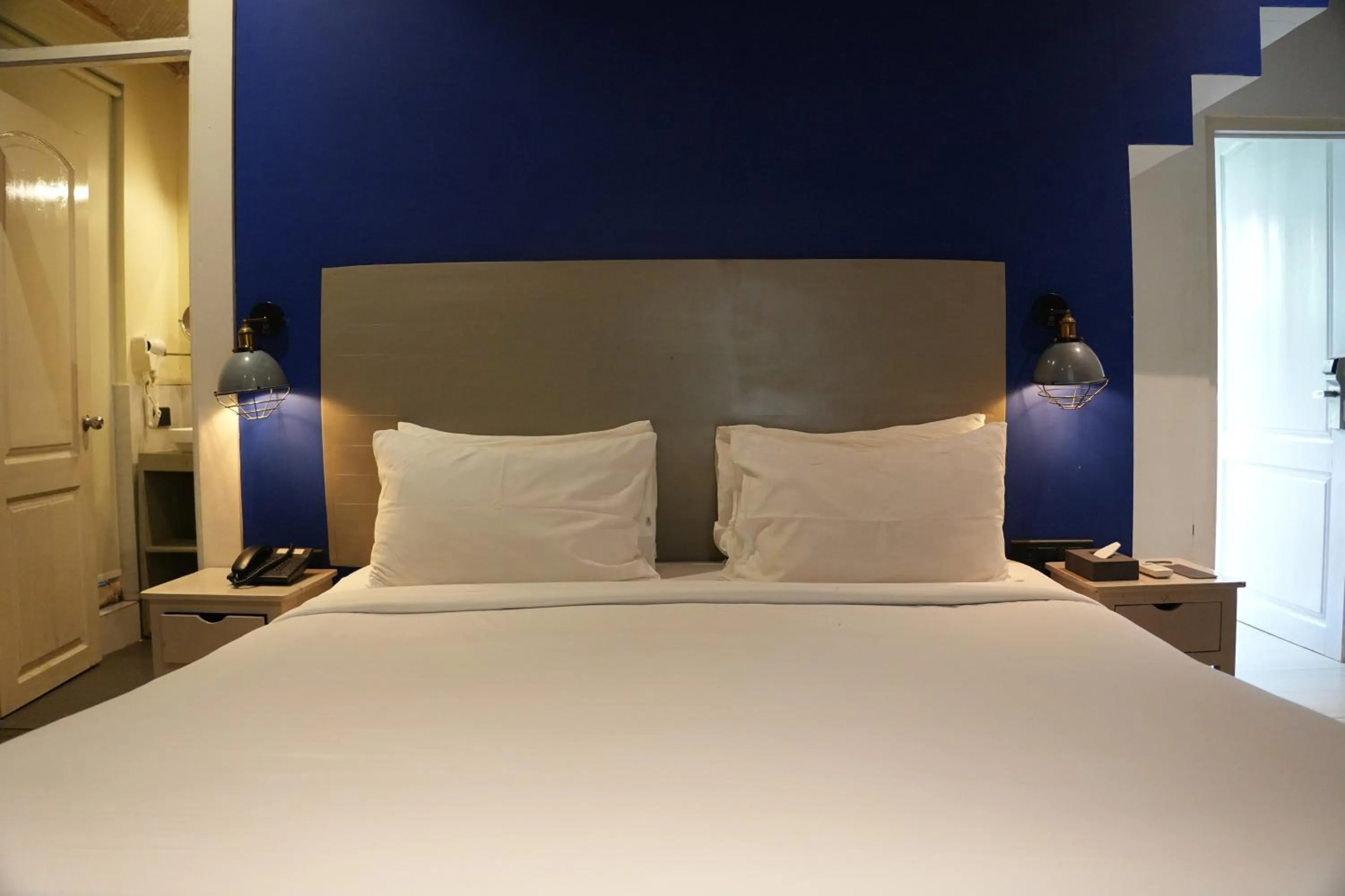 Bedroom, Bed in Living Room Beach Resort