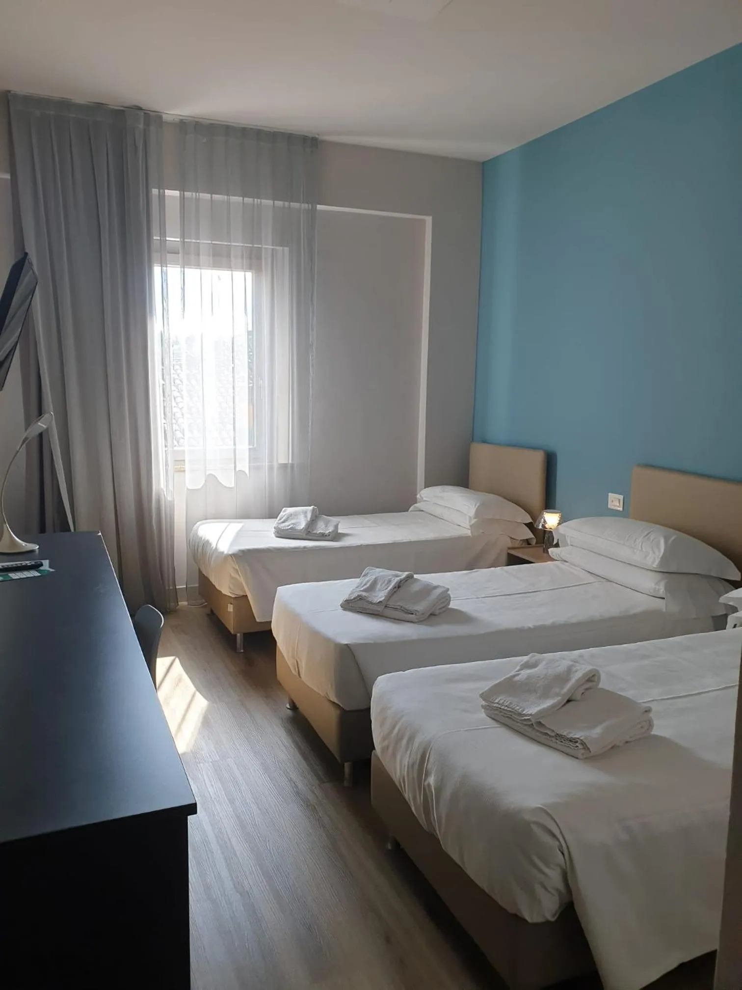 Bed in Hotel De La Ville depandance di Hotel Augustus