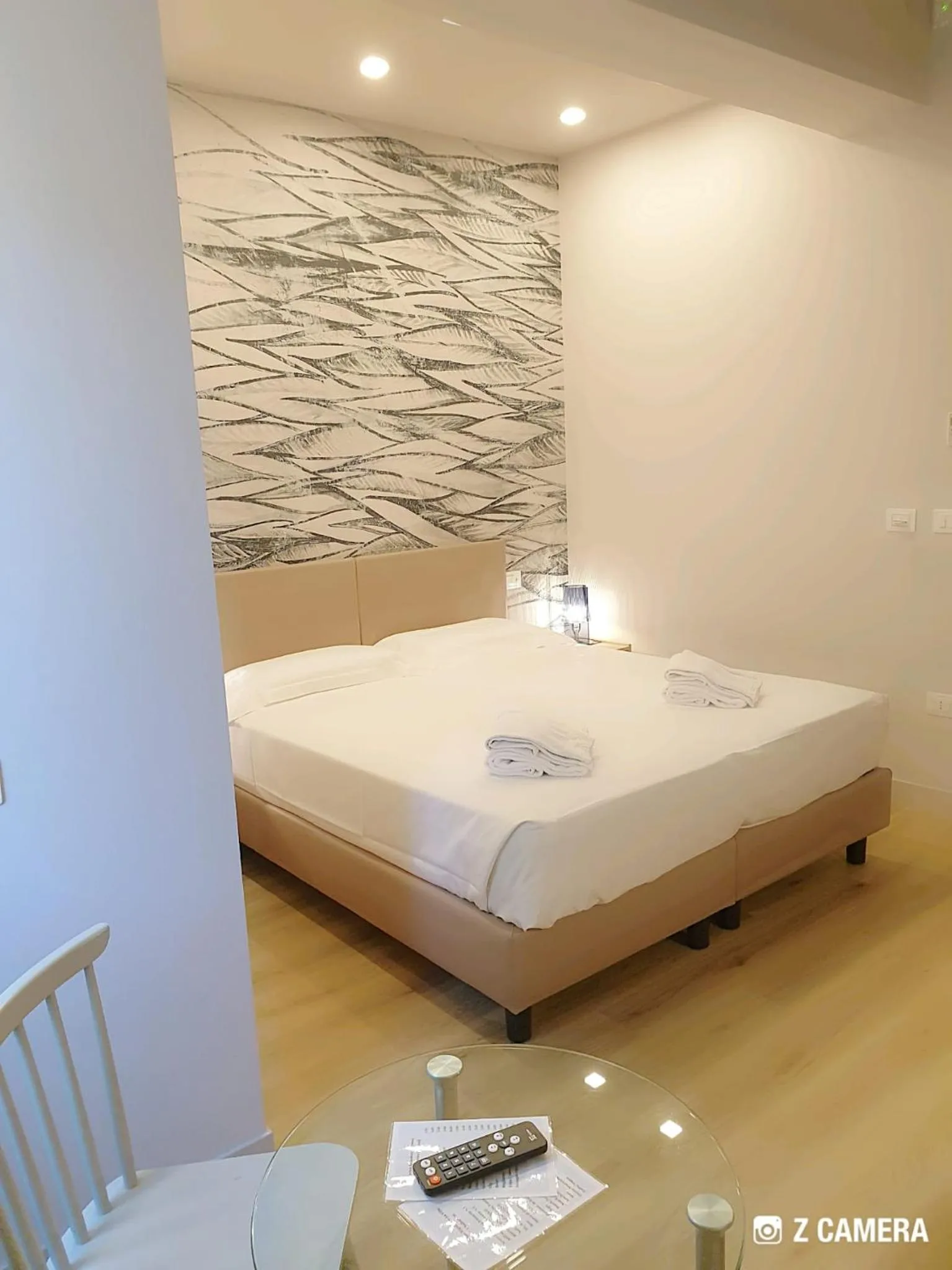 Bed in Hotel De La Ville depandance di Hotel Augustus