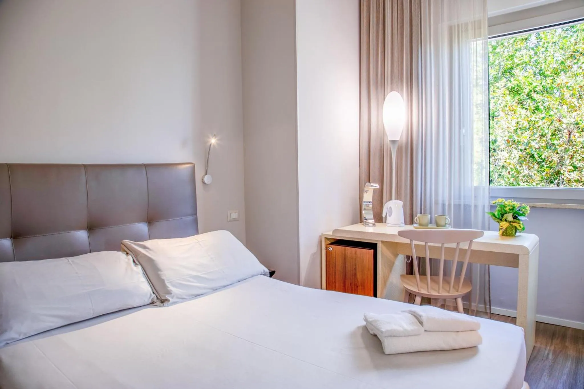 Bed in Hotel De La Ville depandance di Hotel Augustus